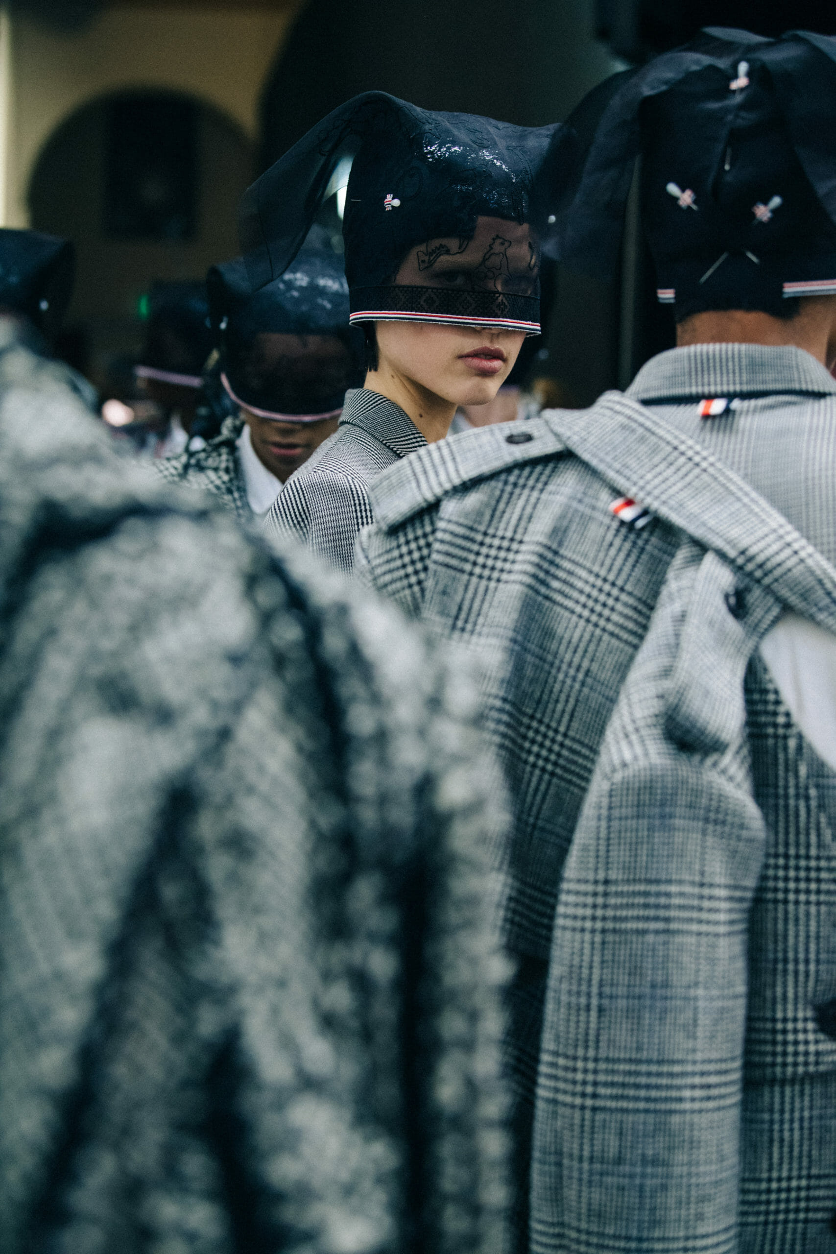 Models wearing Thom Browne suits