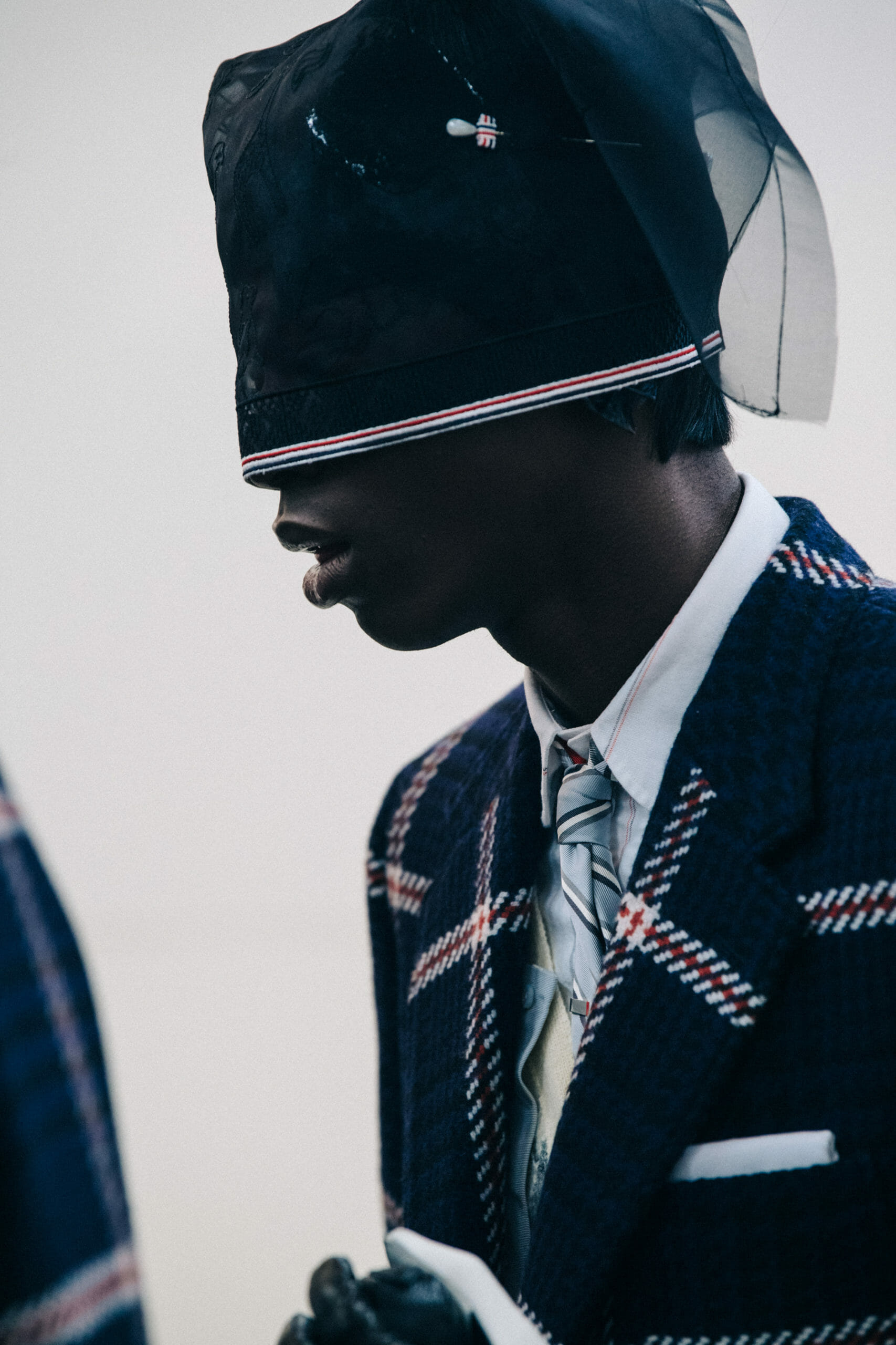 Models wearing Thom Browne suits