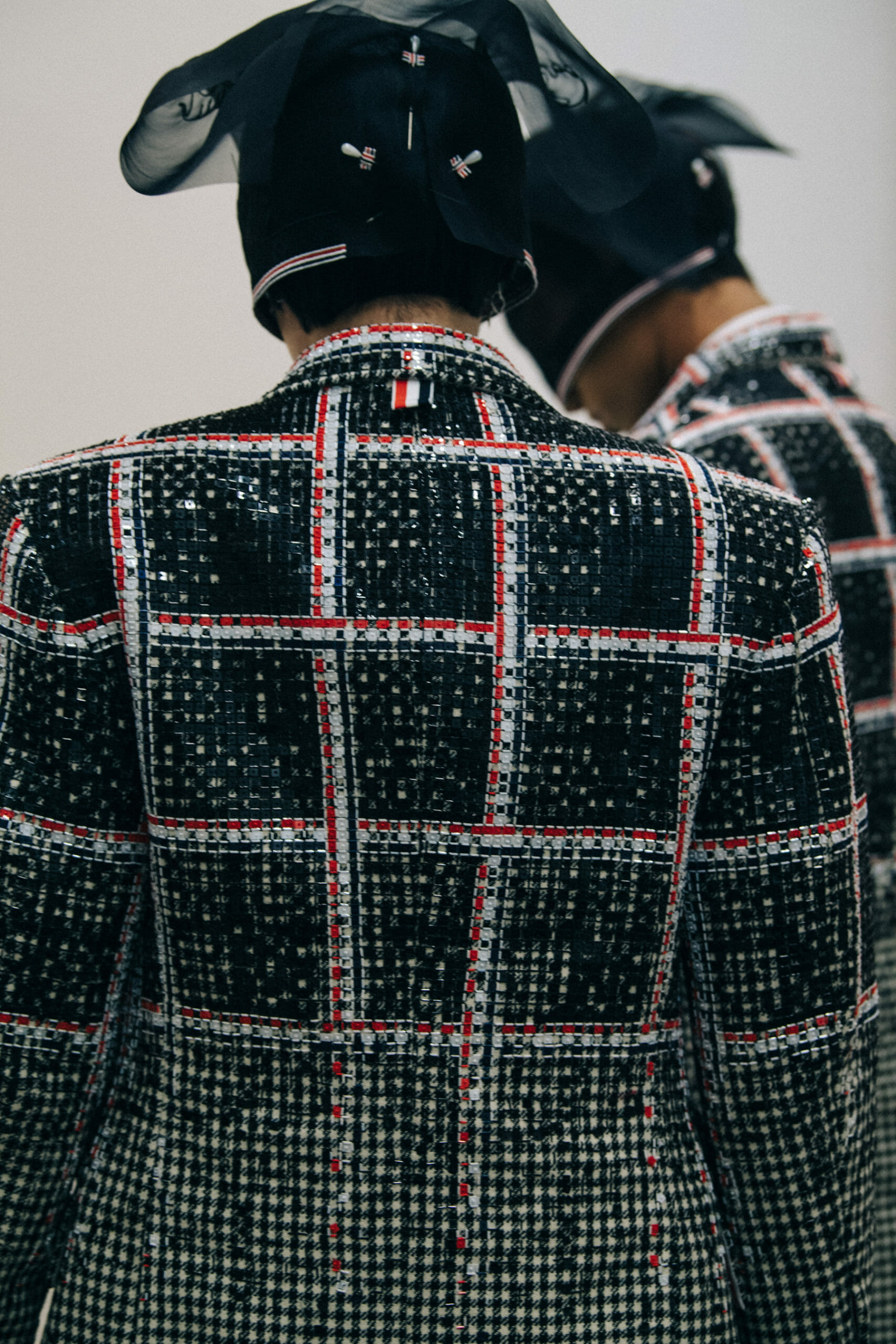 Models wearing Thom Browne suits