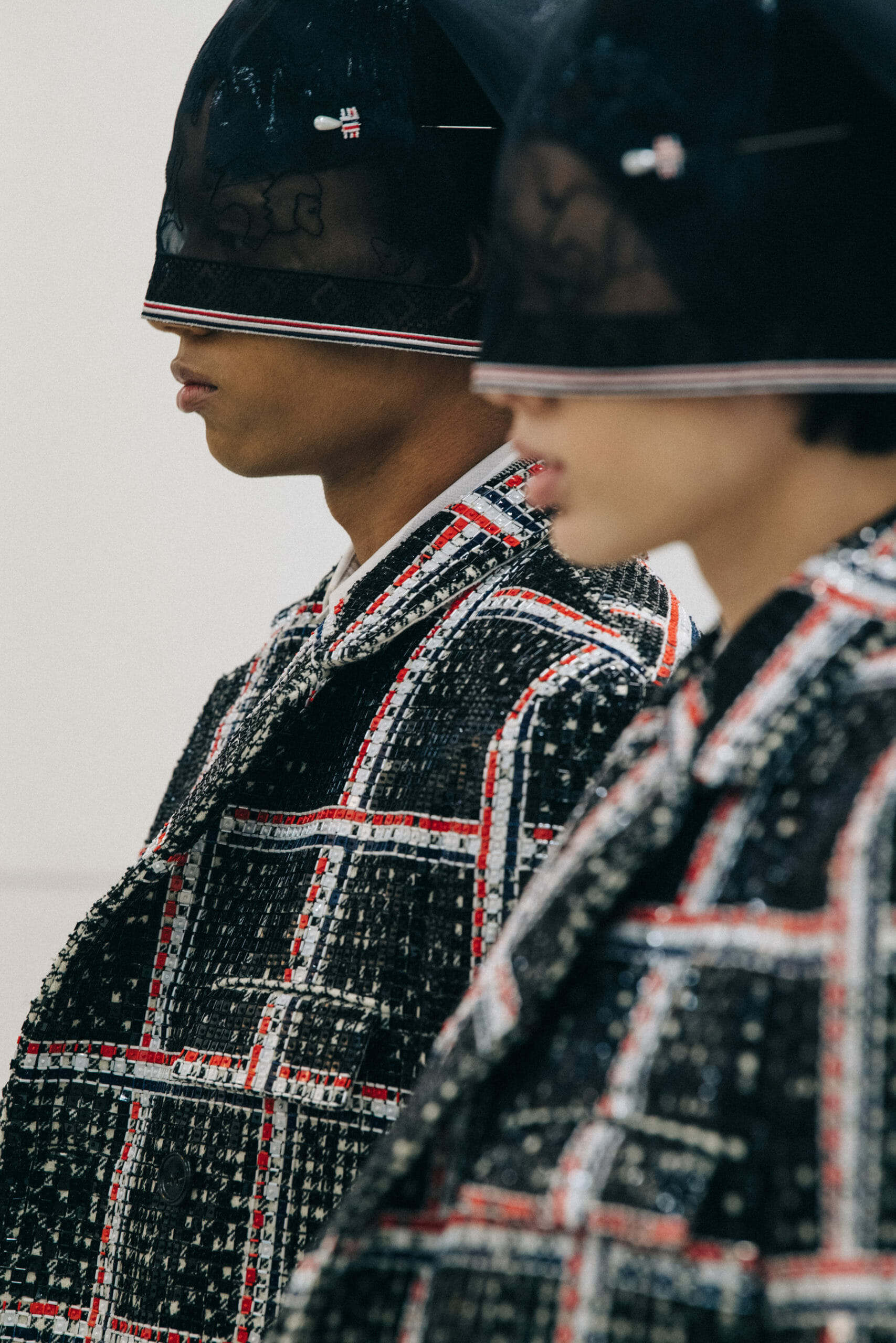 Models wearing Thom Browne suits