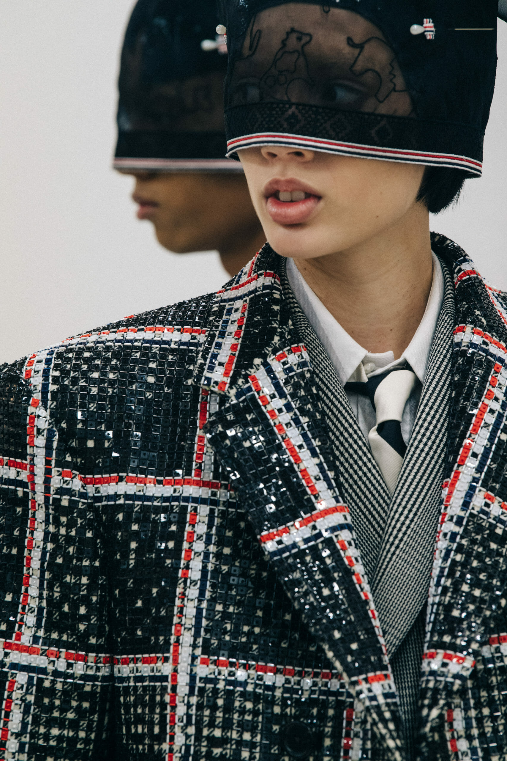 Models wearing Thom Browne suits