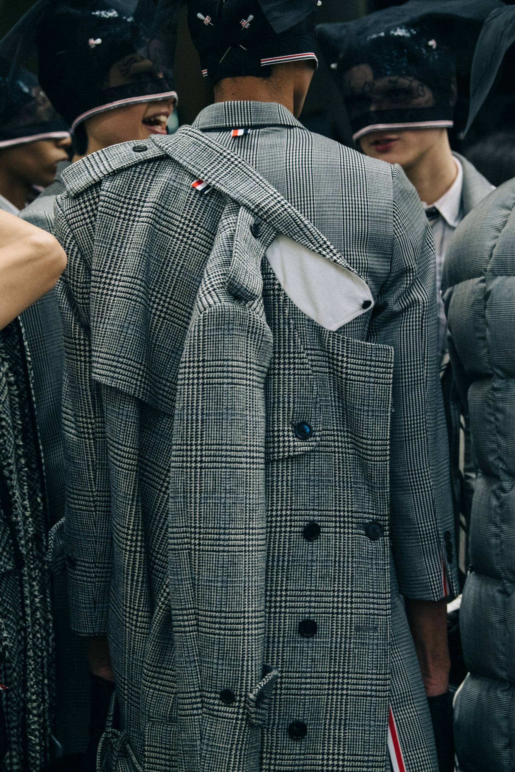 Models wearing Thom Browne suits
