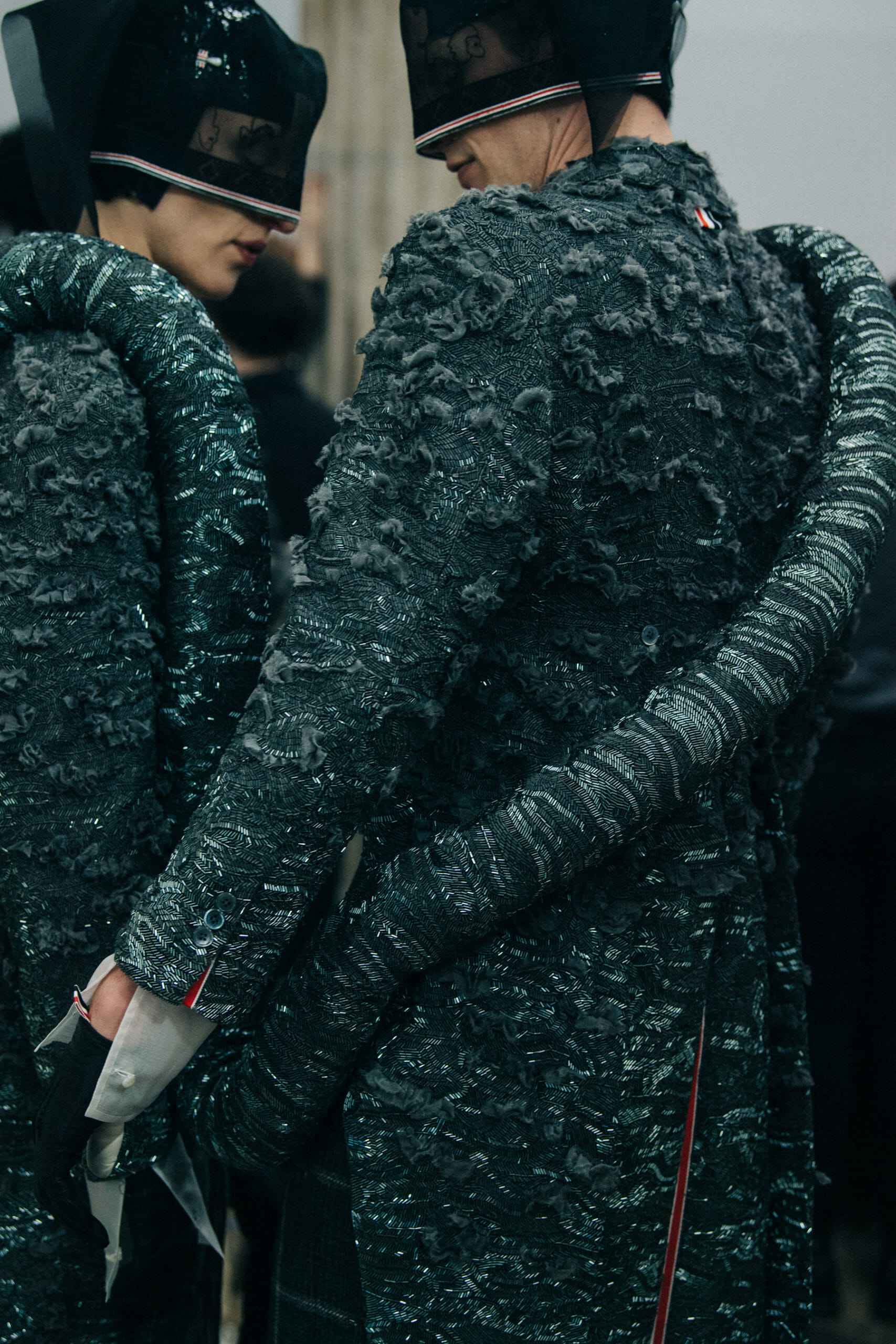 Models wearing Thom Browne suits