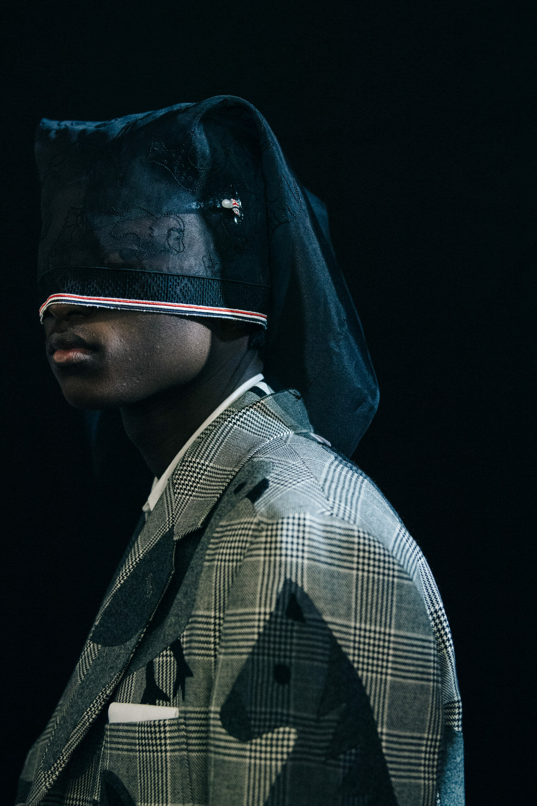 Models wearing Thom Browne suits