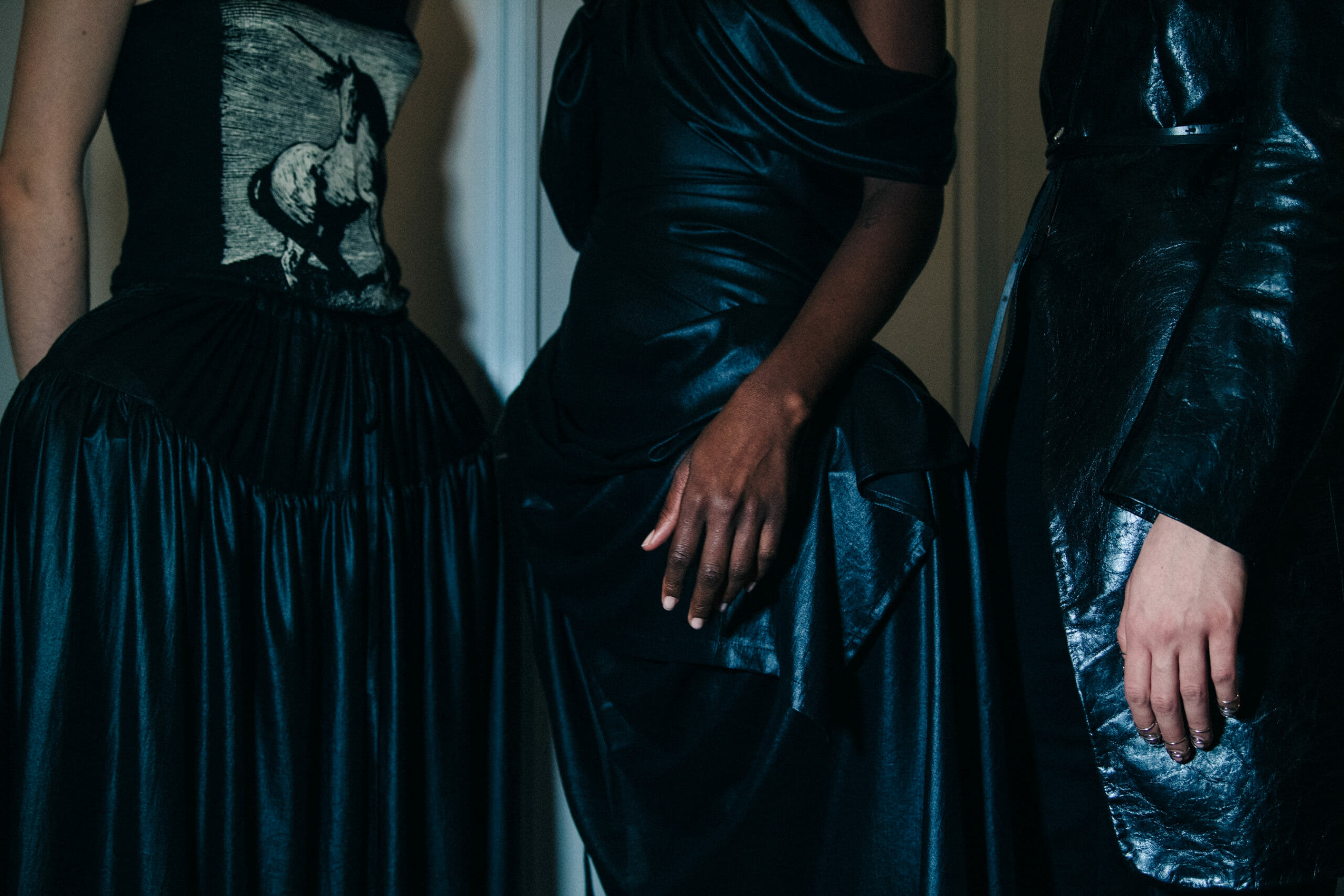 Model wearing black Ann Demeulemeester dress