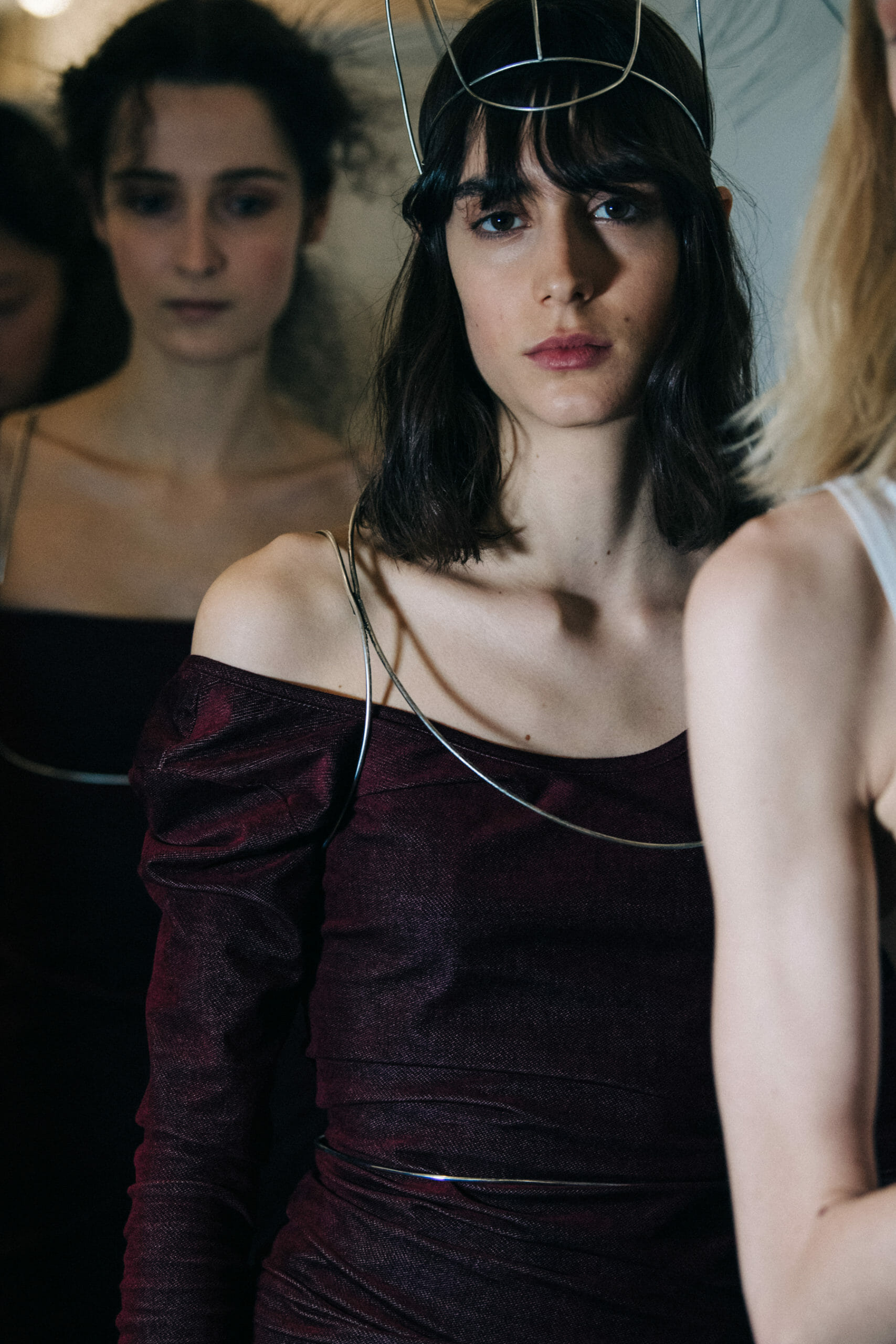 Models wearing metal headpieces at Ann Demeulemeester
