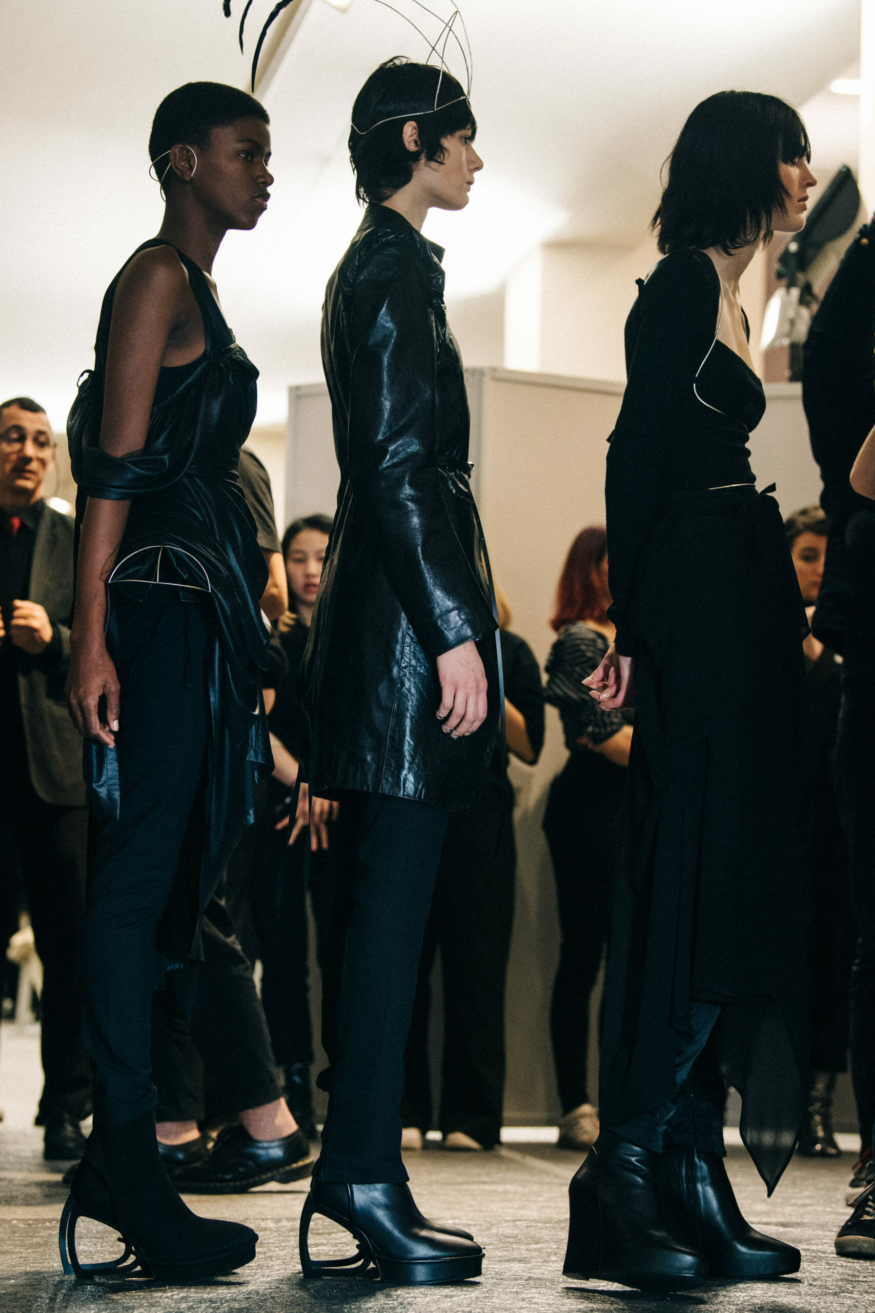 Models wearing black at Ann Demeulemeester