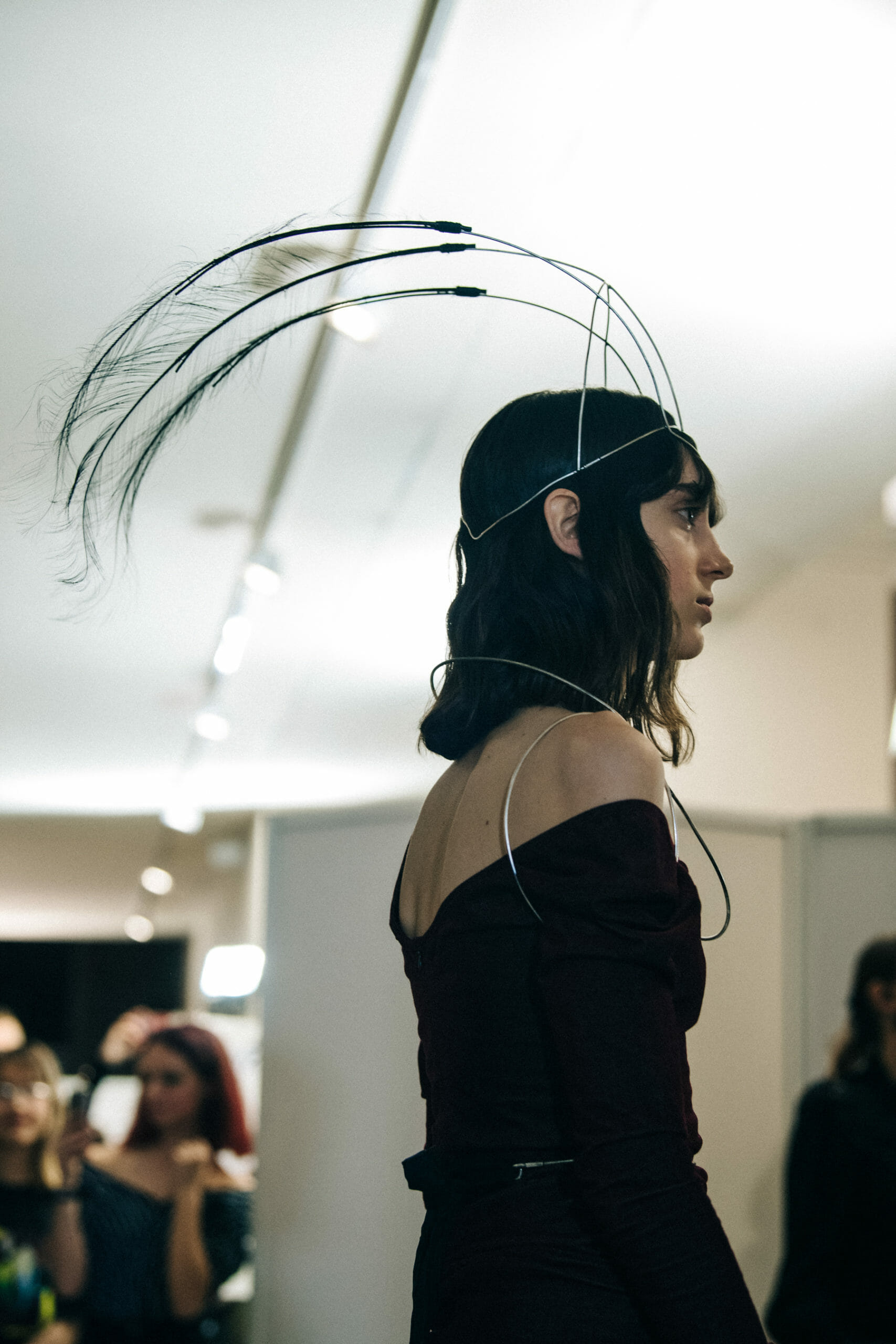 Model wearing black Ann Demeulemeester dress