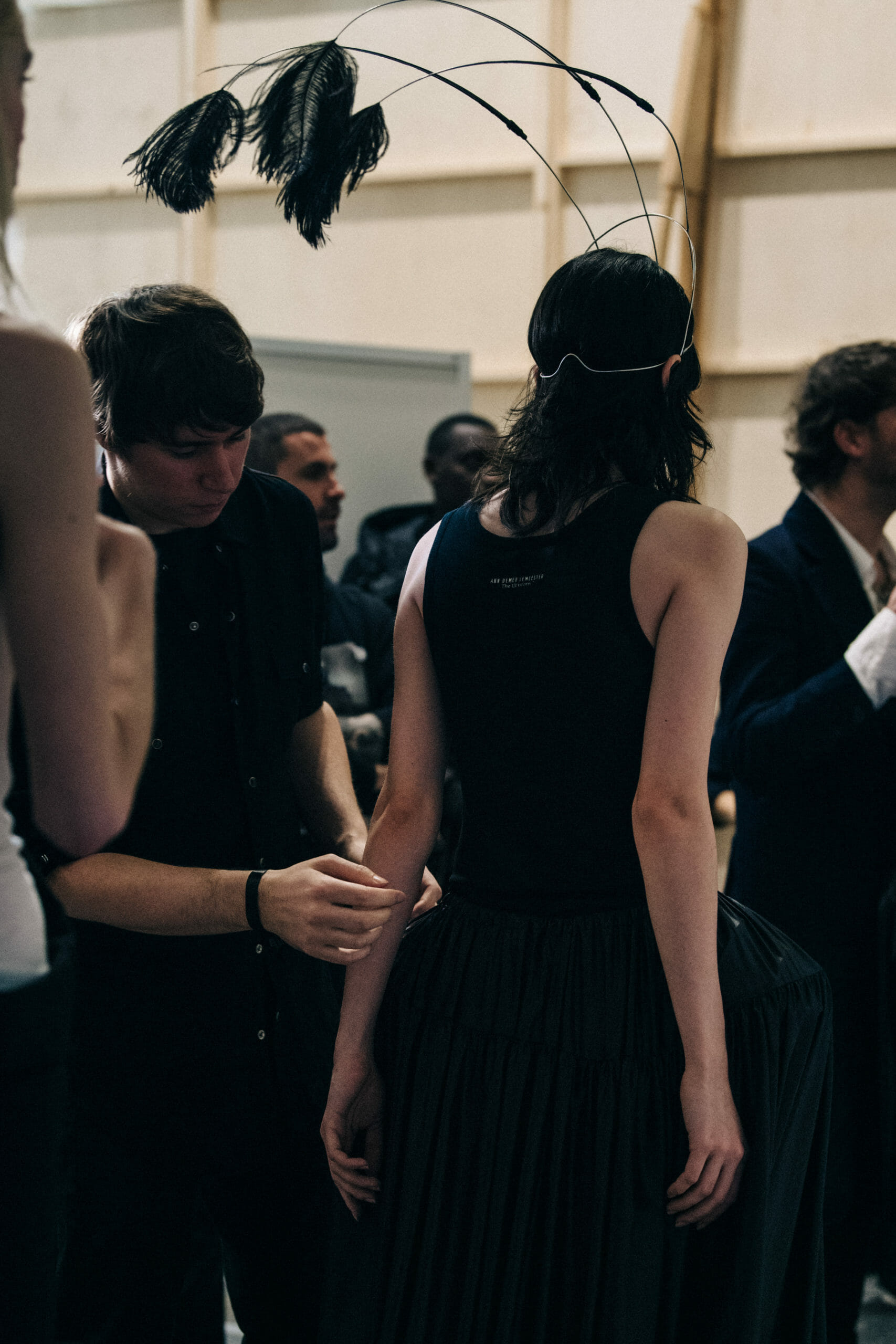 Model wearing black Ann Demeulemeester dress