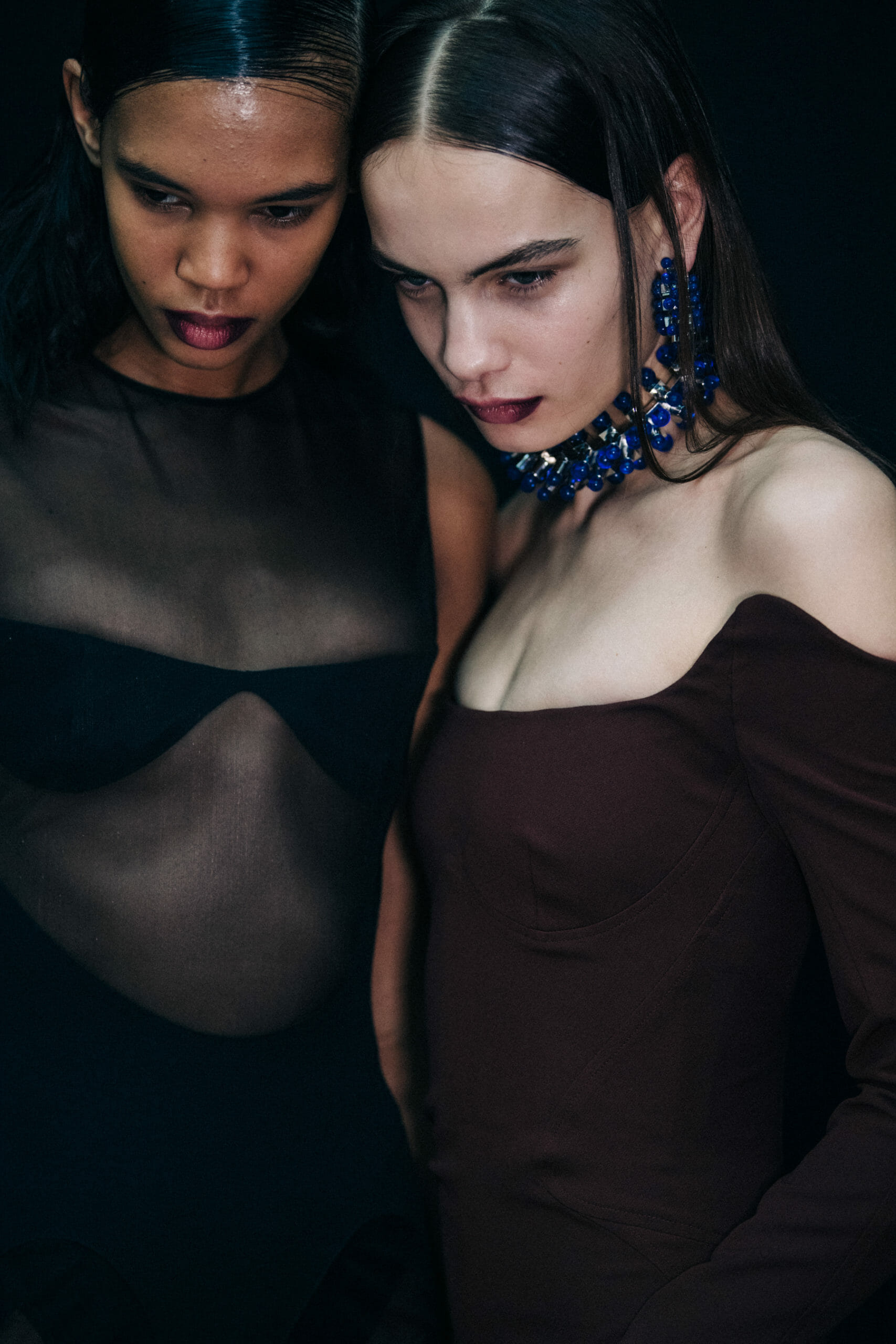 Models wearing black Mugler outfit