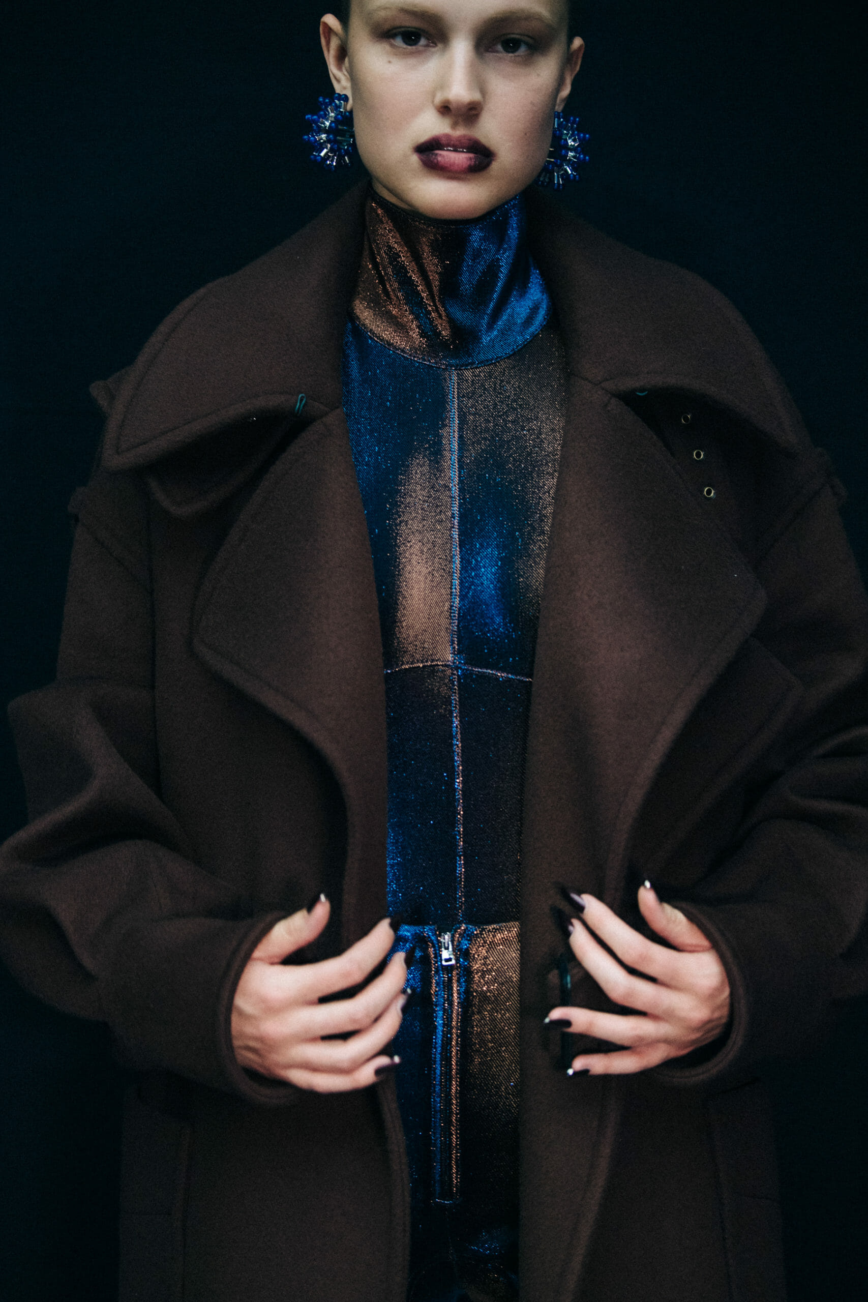 Model wearing blue Mugler clothing
