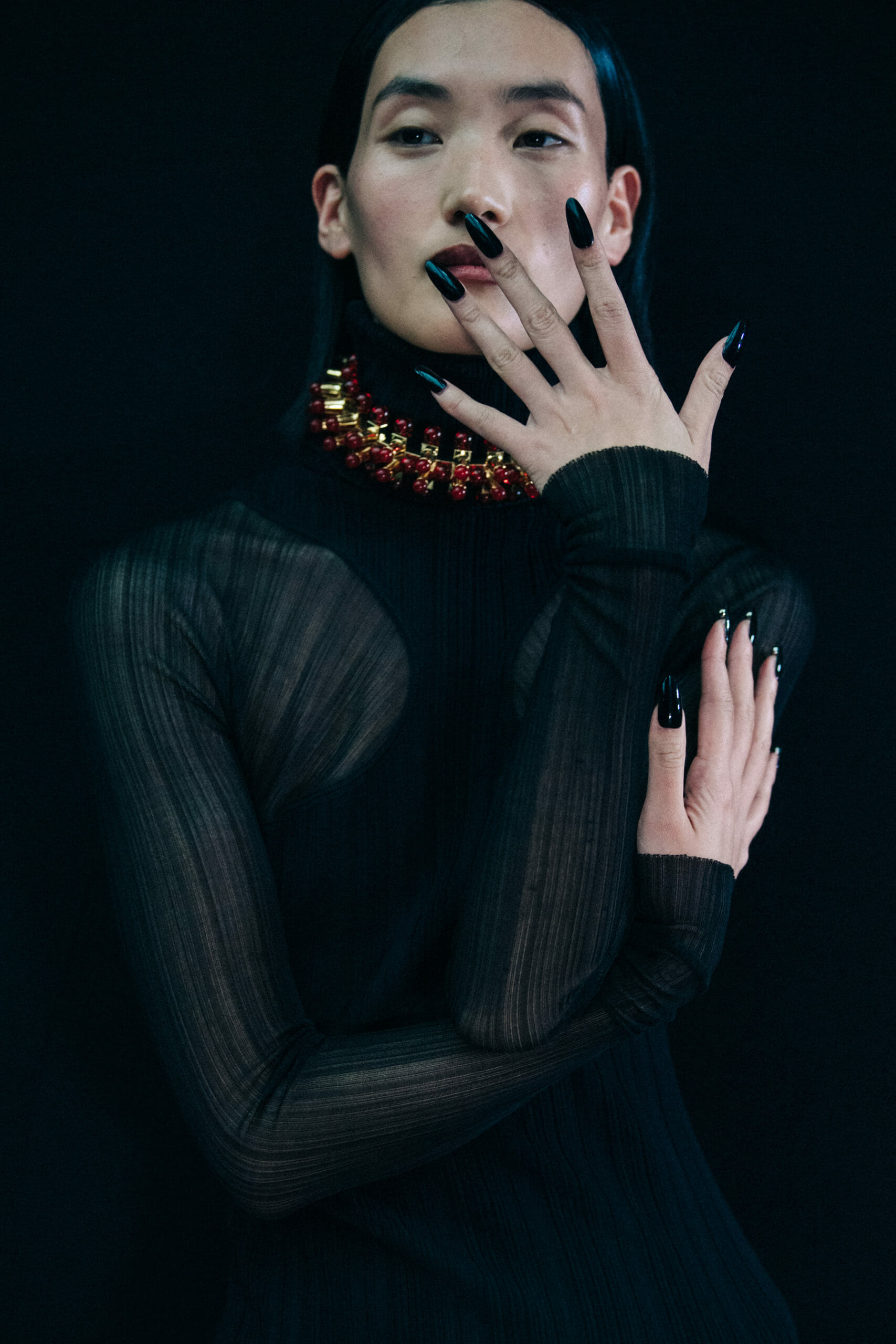 Model wearing lace Mugler dress