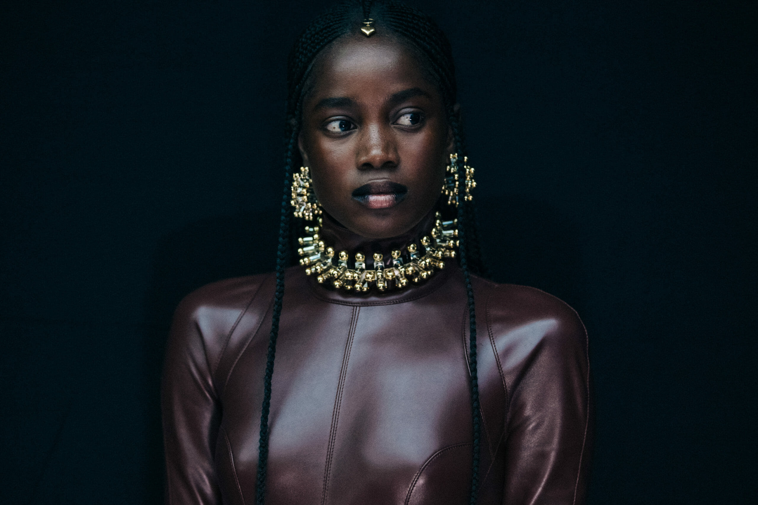 Model wearing brown Mugler coat