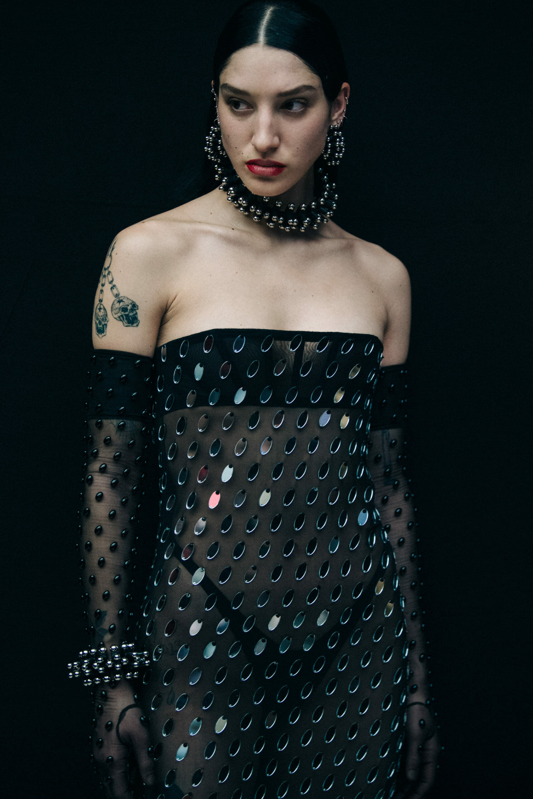 Model wearing lace Mugler dress