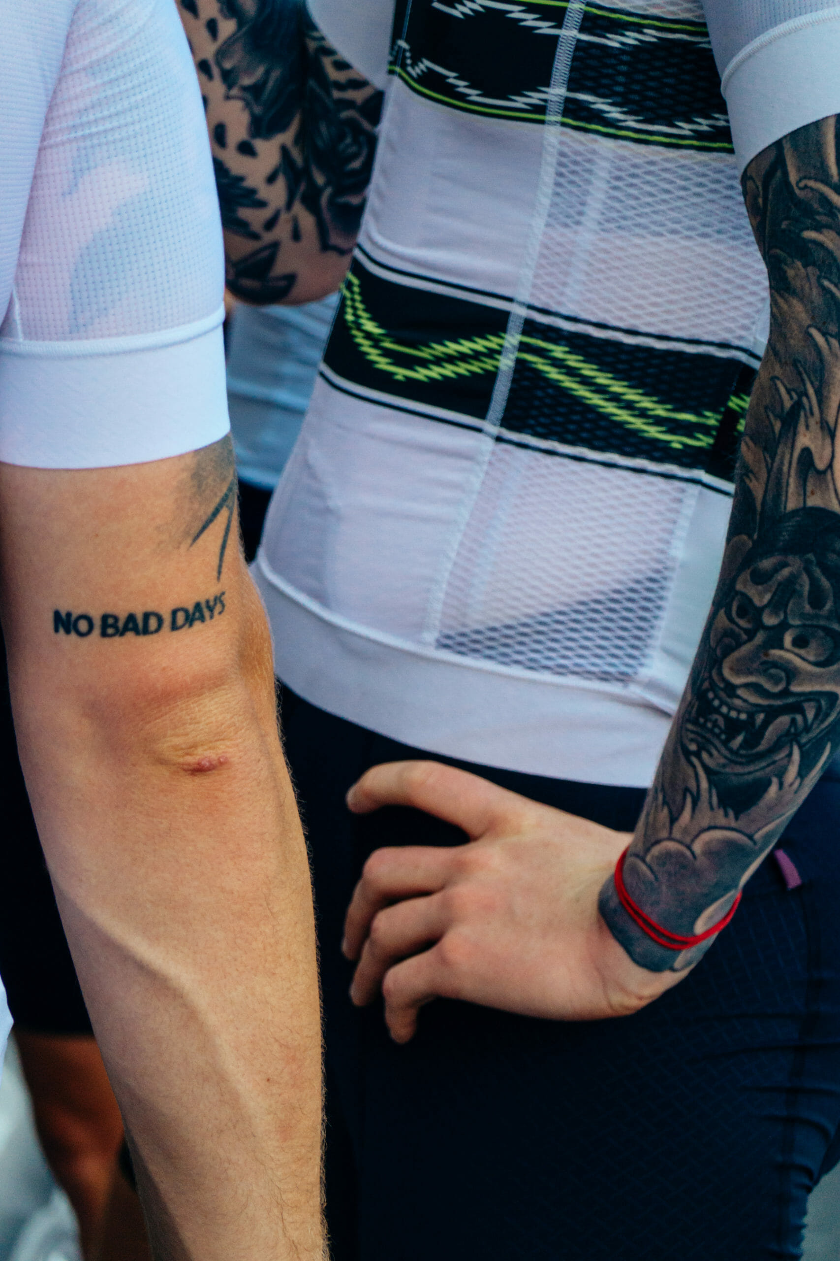 Tattooed Danish cyclists wearind Pas Normal Studios