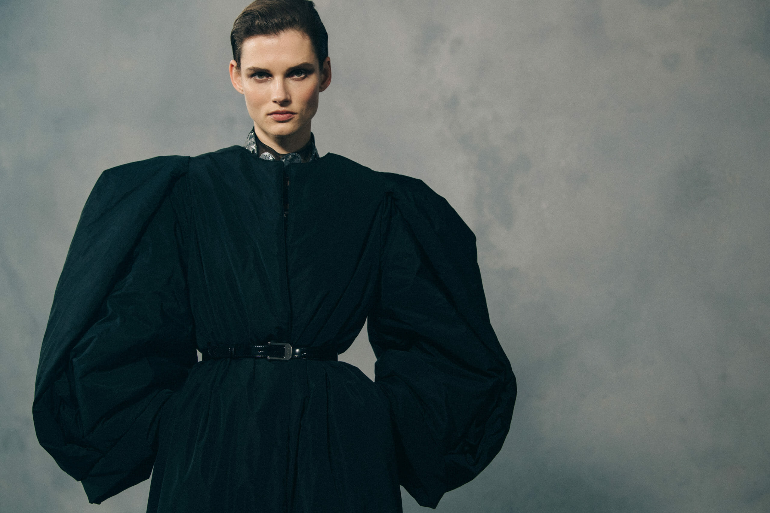 Model wearing black dress at Givenchy