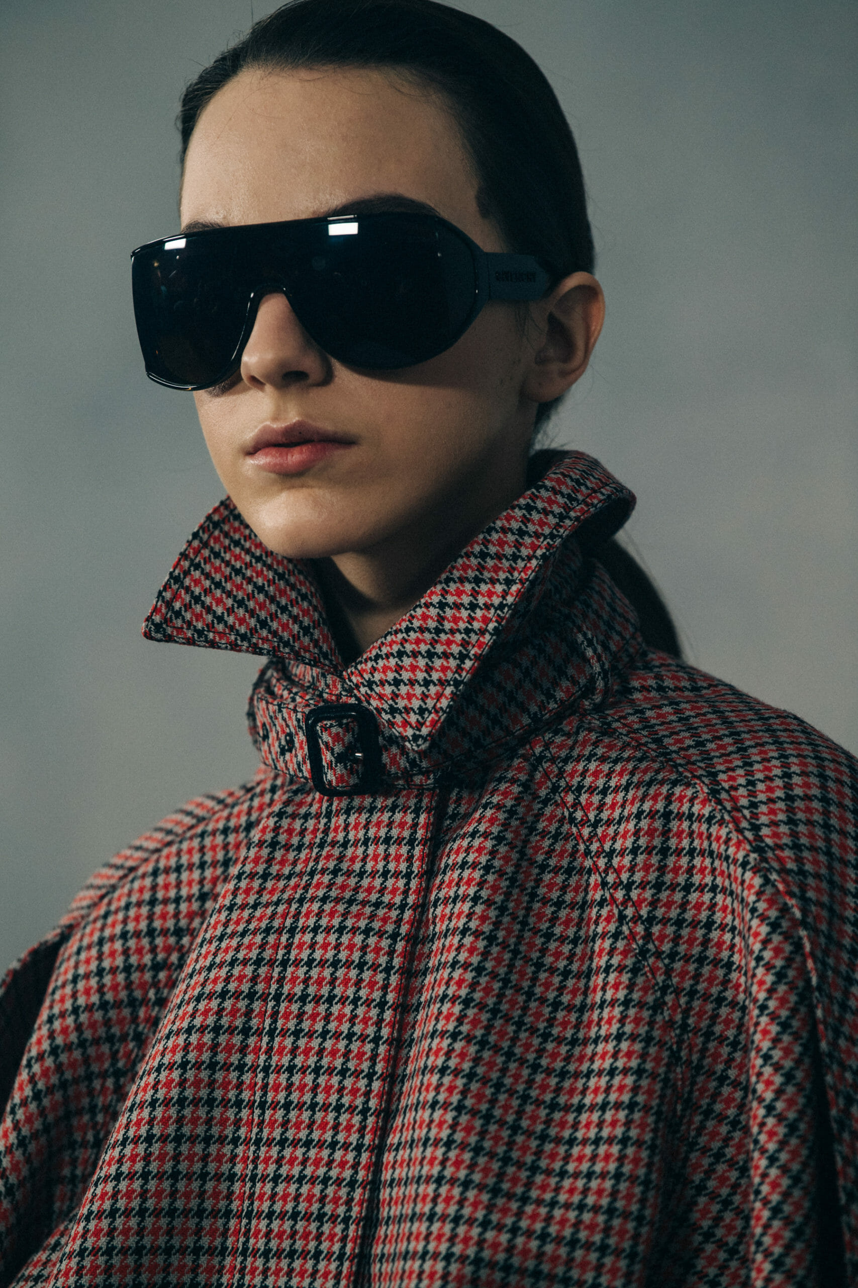 Model wearing pattern coat at Givenchy