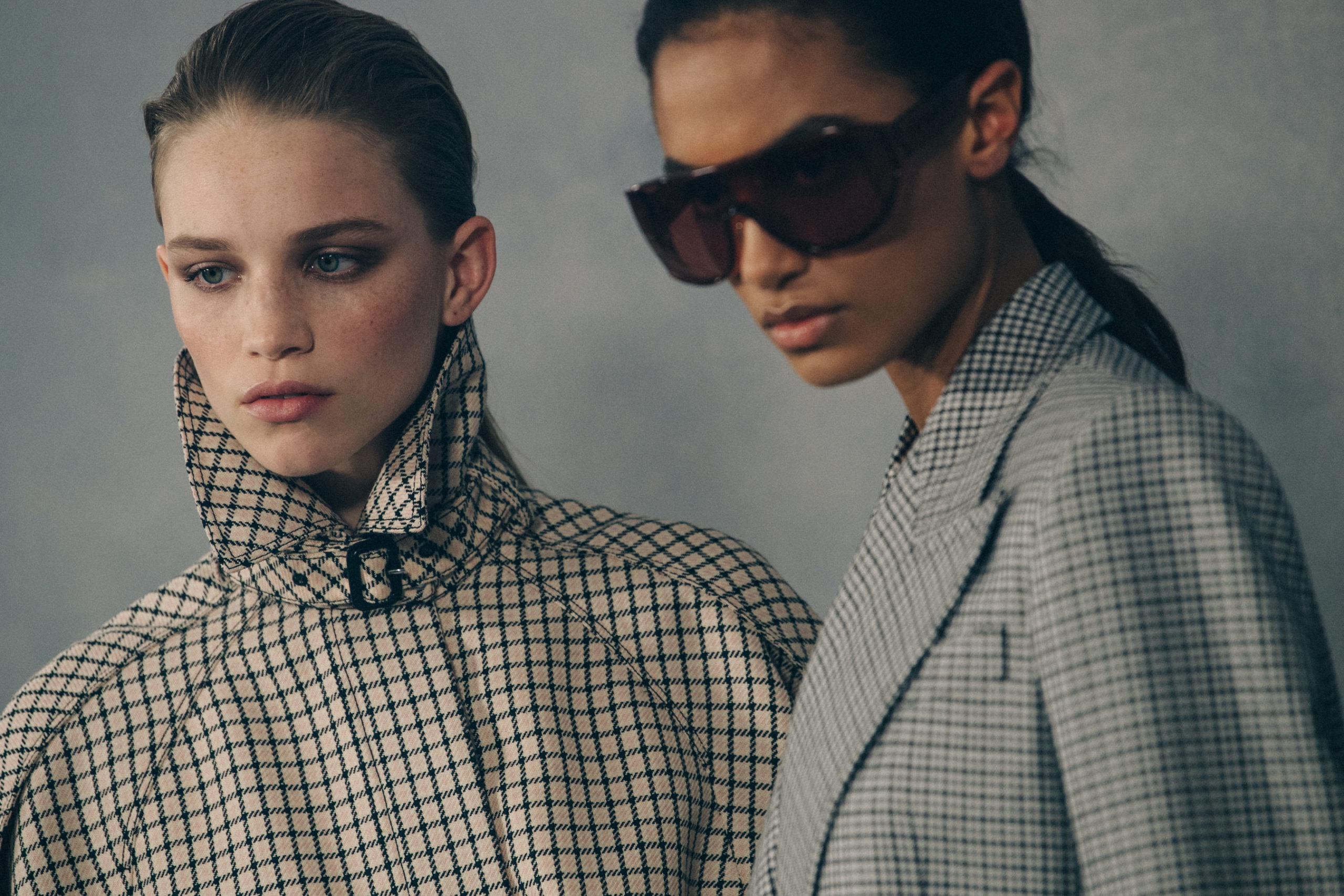 Model wearing pattern coat at Givenchy