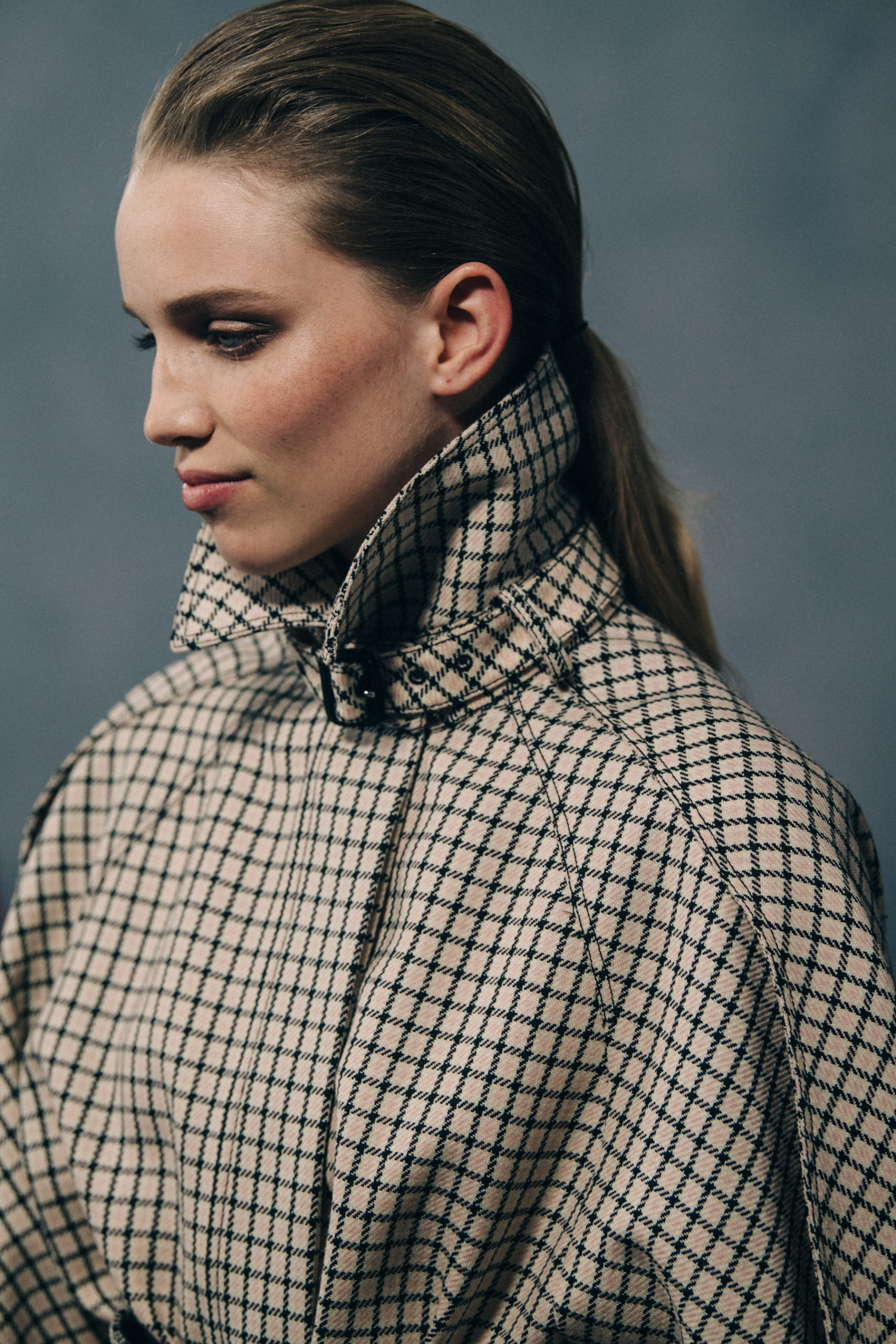 Model wearing pattern coat at Givenchy