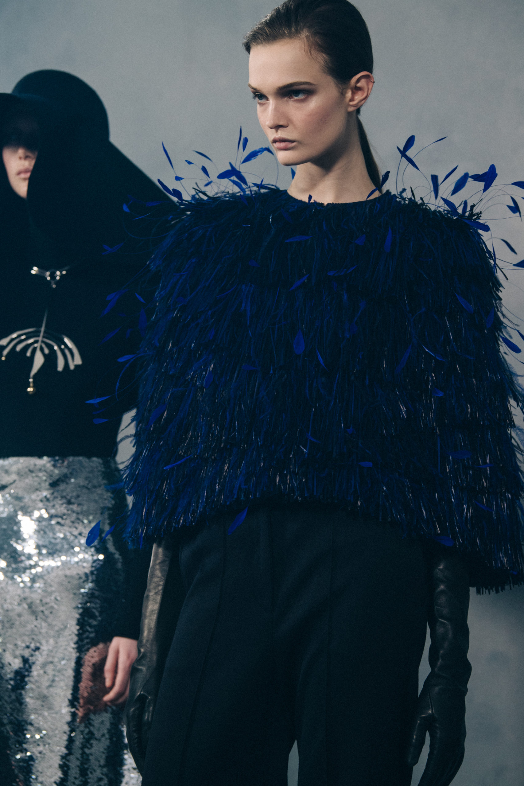 Model wearing large hat at Givenchy
