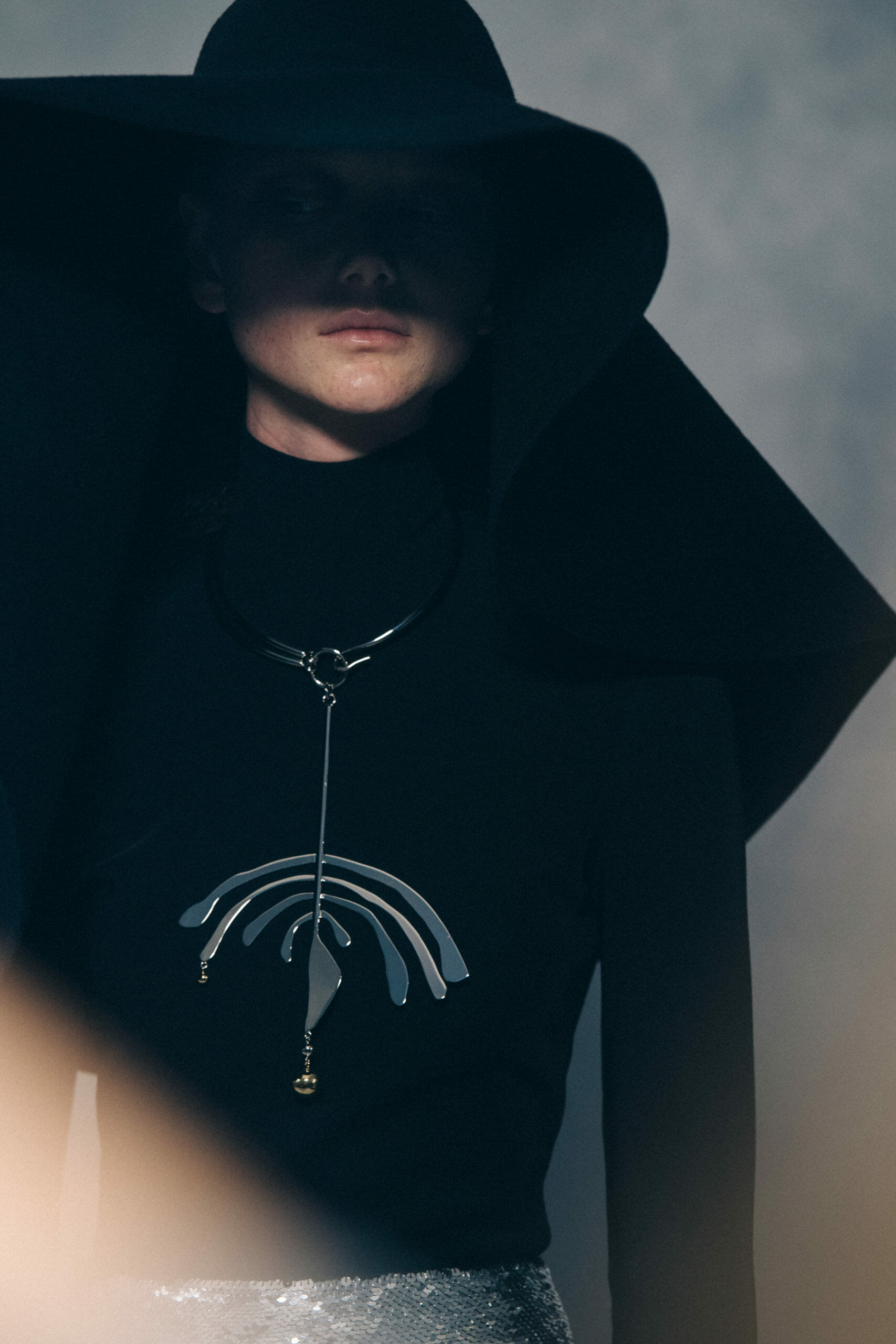Model wearing large hat at Givenchy