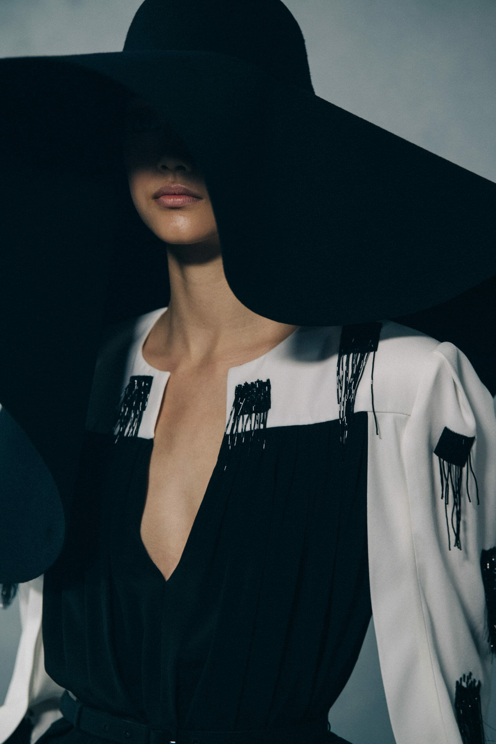 Model wearing large hat at Givenchy