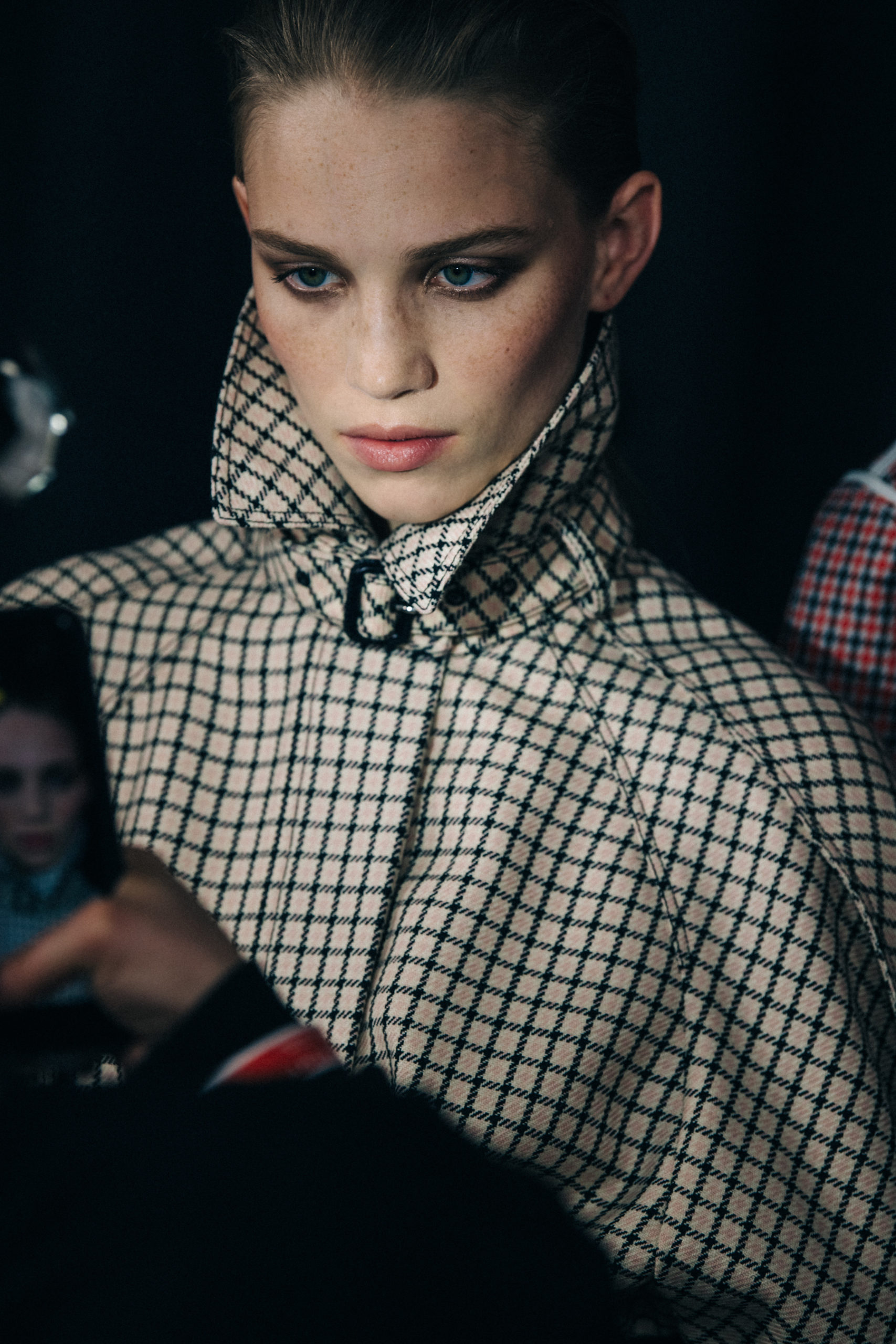 Model wearing pattern coat at Givenchy