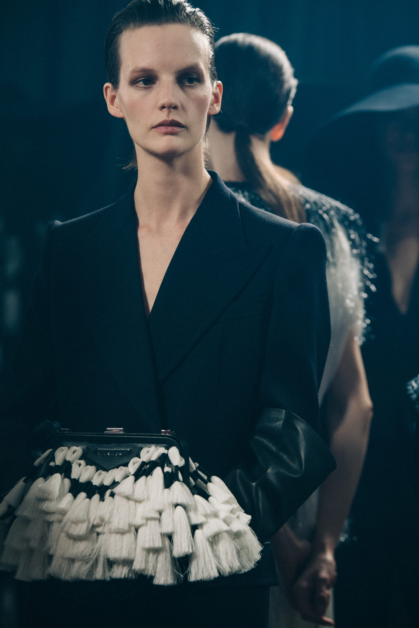 Model wearing black dress at Givenchy