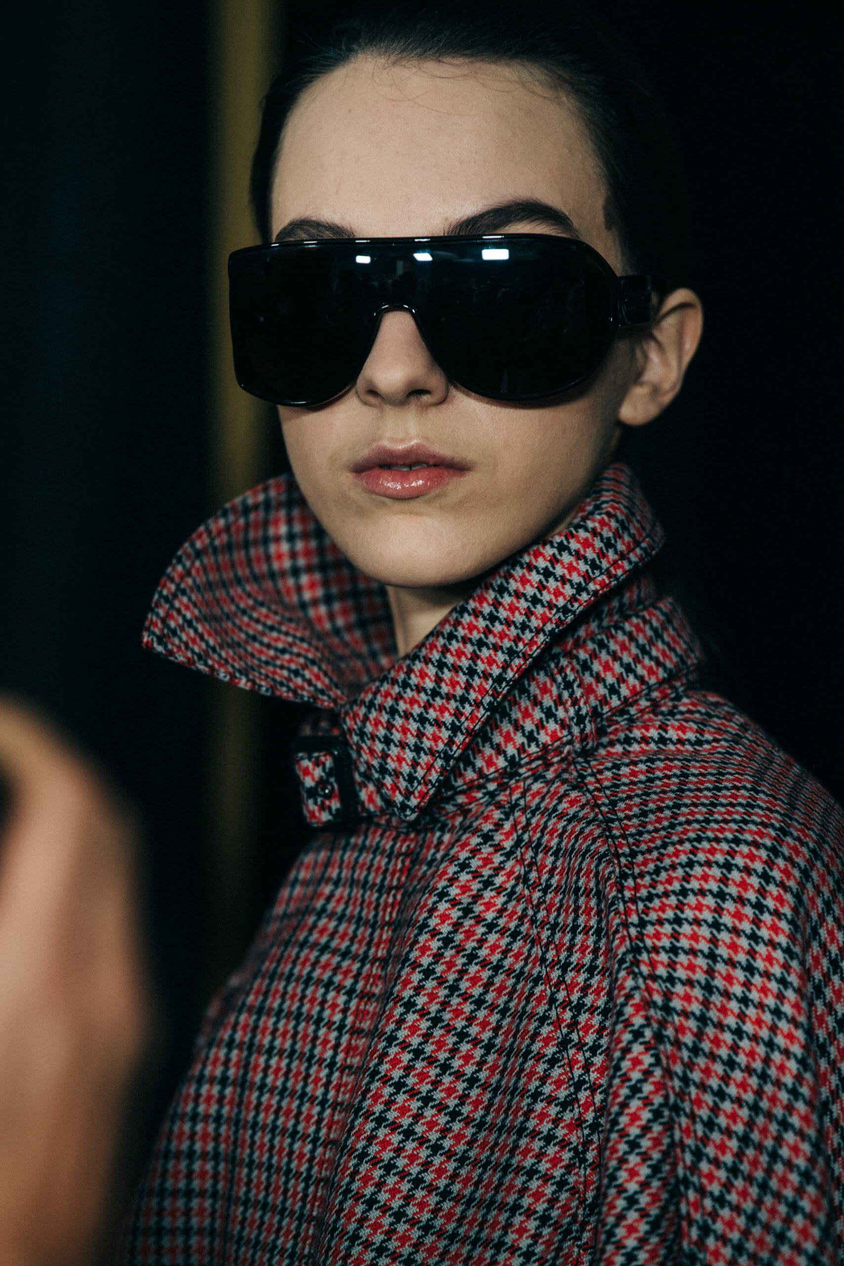 Model wearing pattern coat at Givenchy