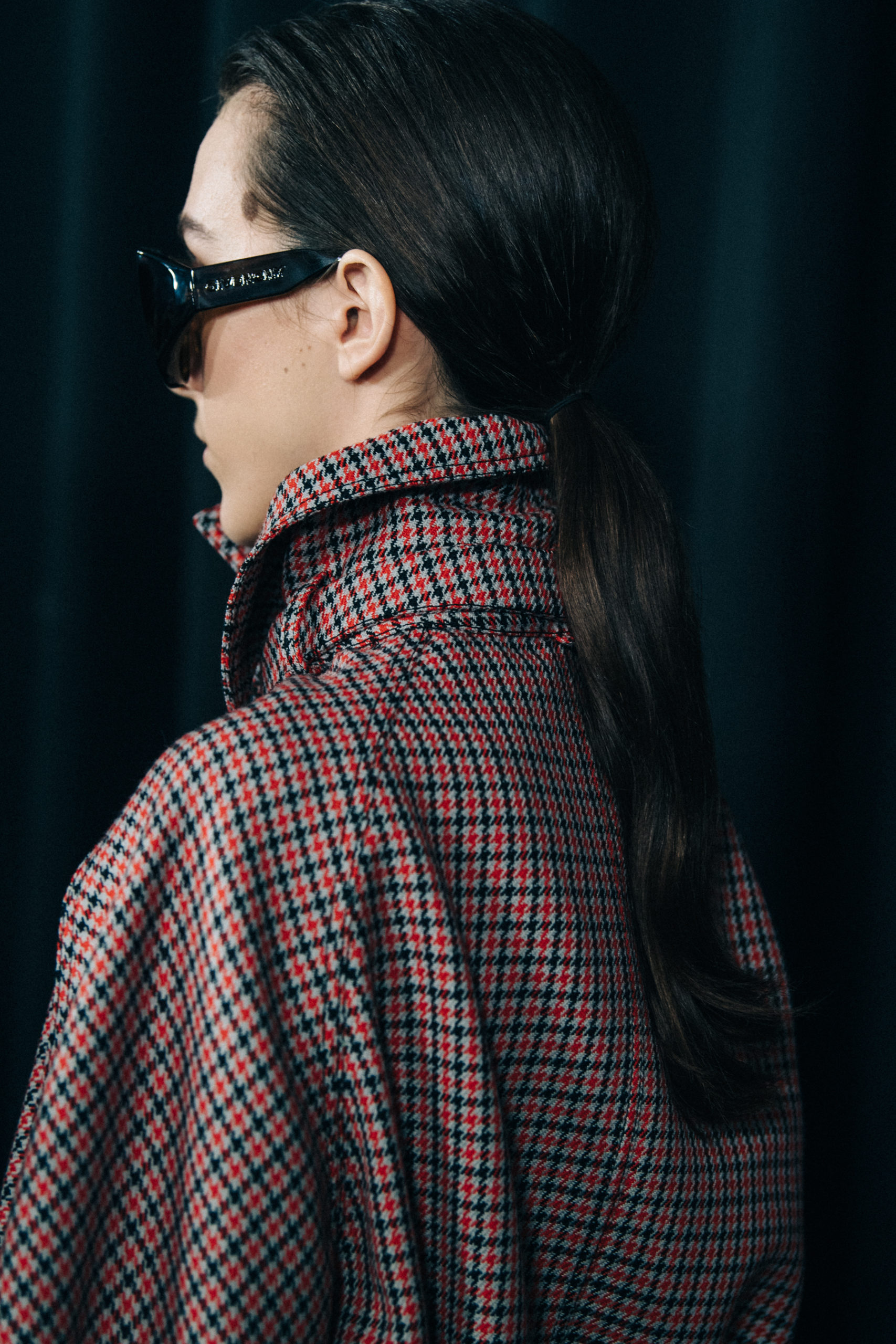 Model wearing pattern coat at Givenchy