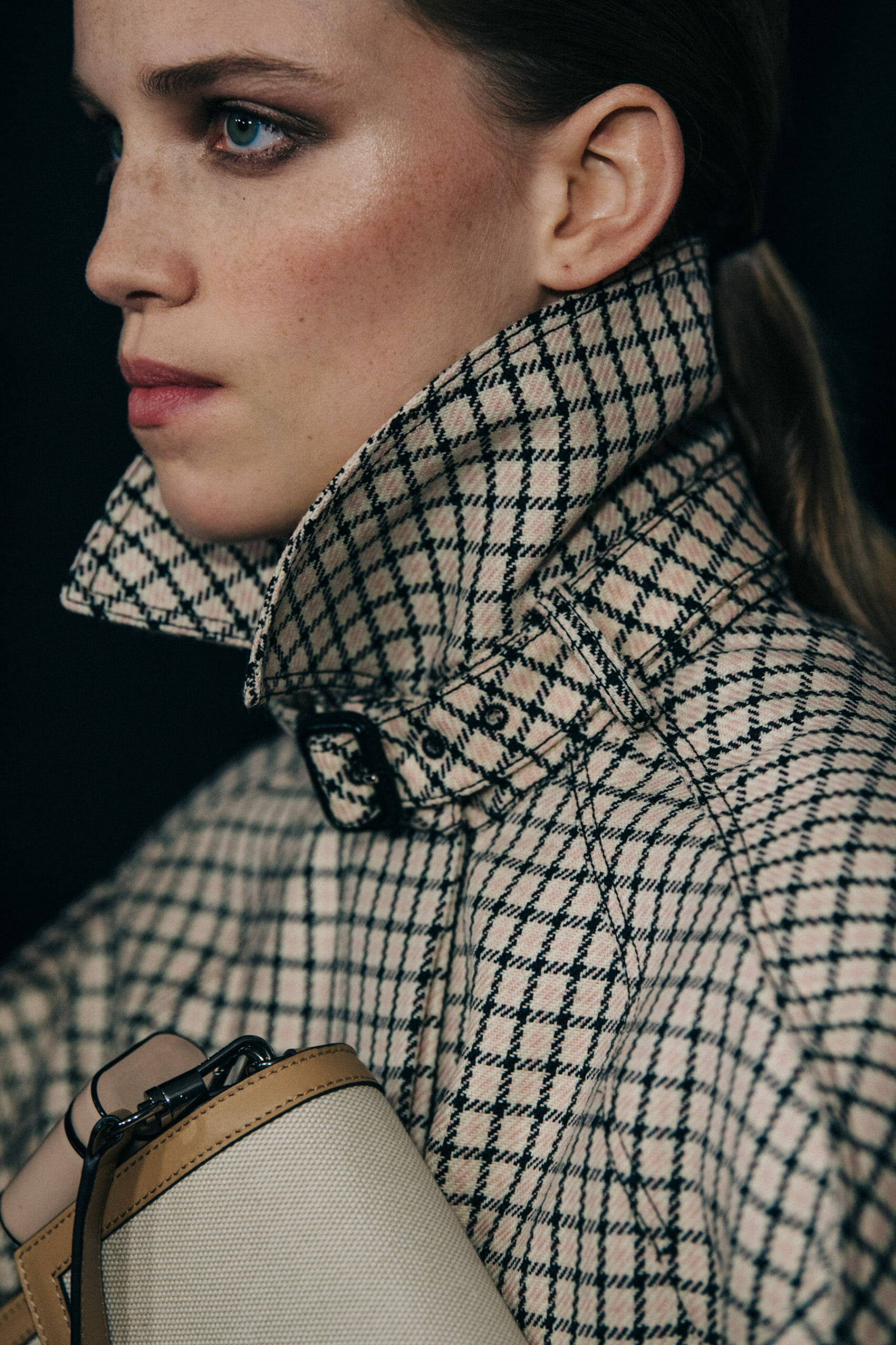 Model wearing pattern coat at Givenchy