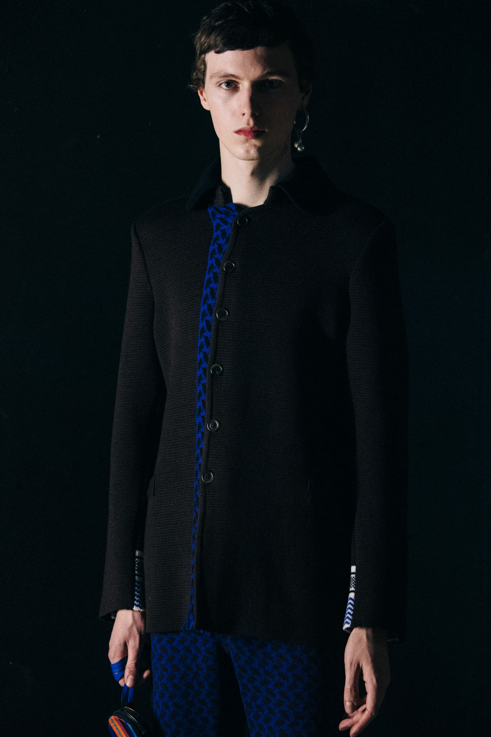 Model wearing black at Kenneth Ize