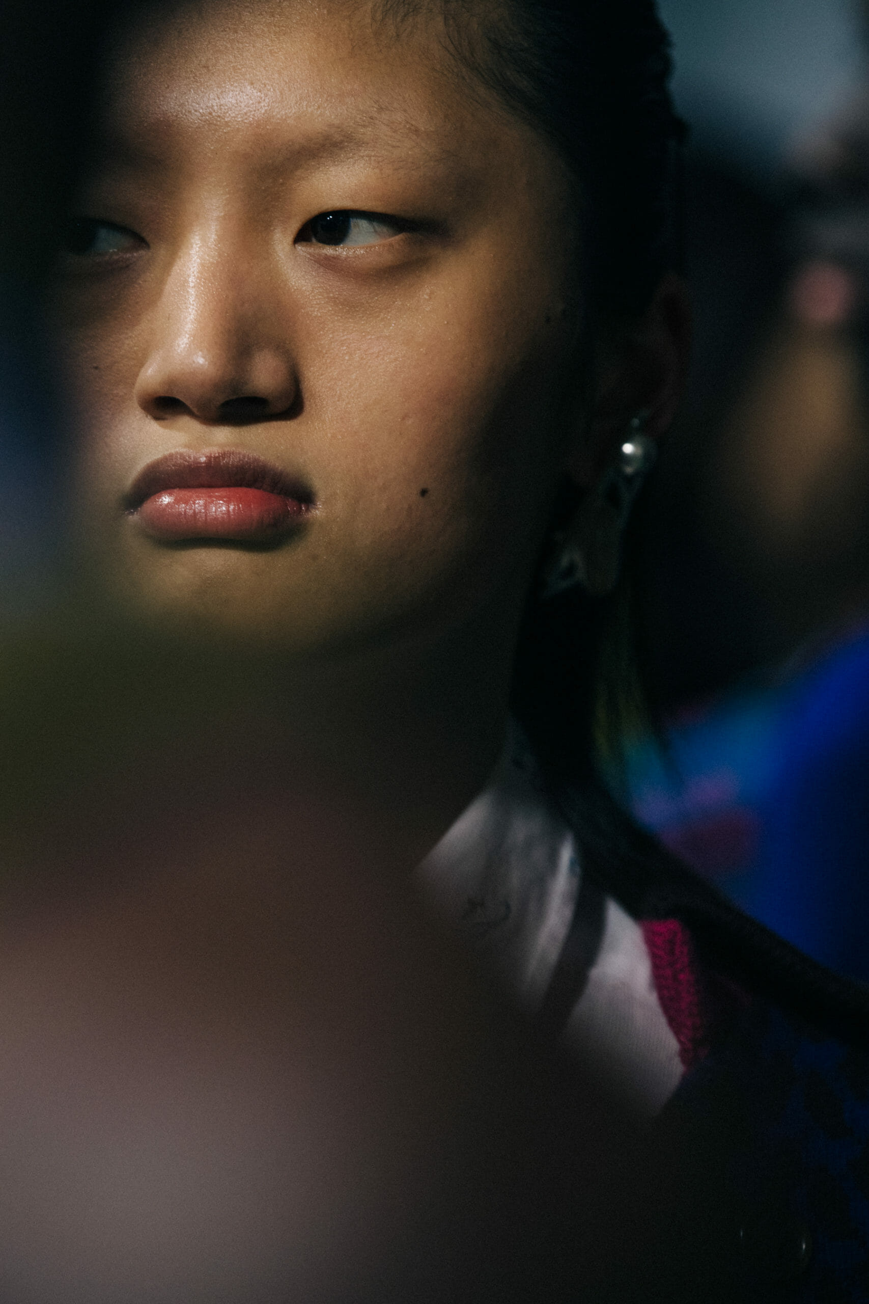 Model wearing silver earring