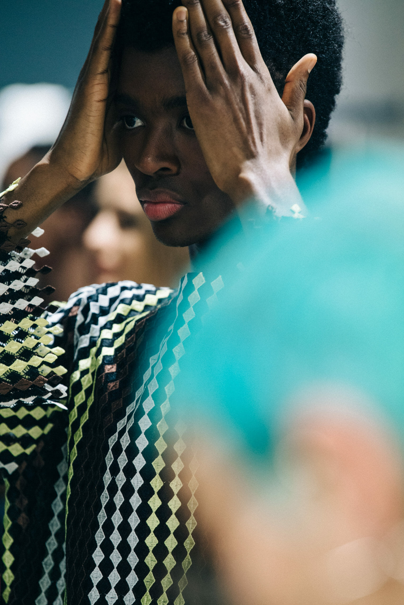 Model wearing yellow check at Kenneth Ize