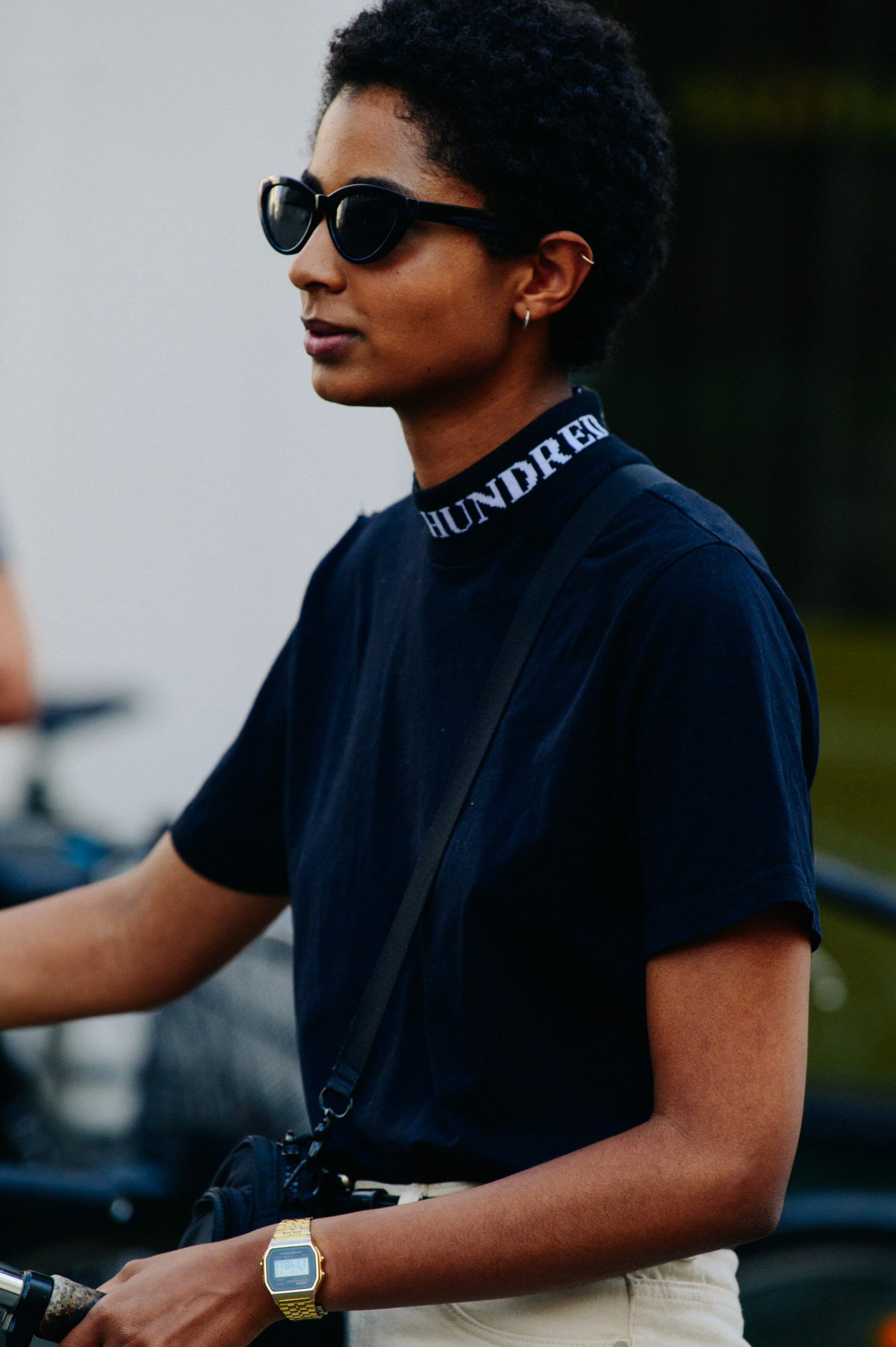 Model wearing black top