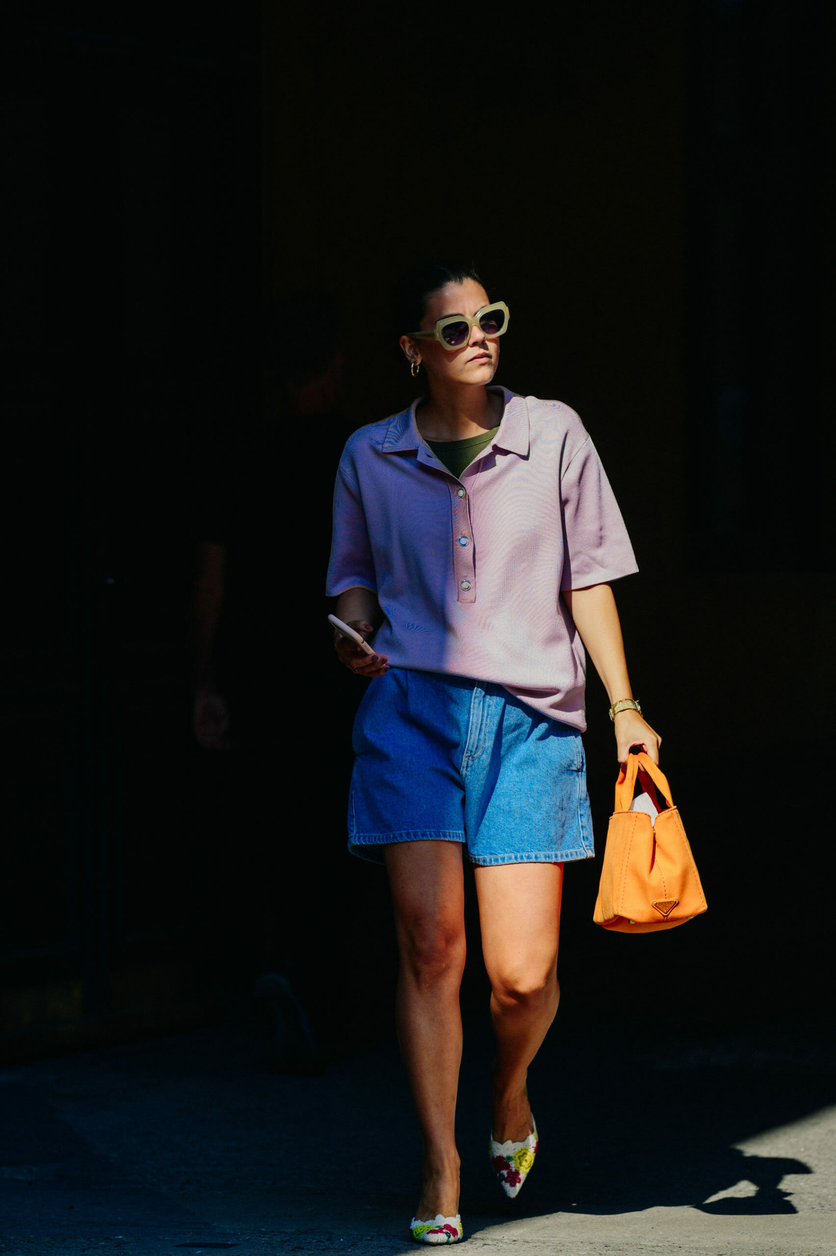 Woman wearing denim skirt