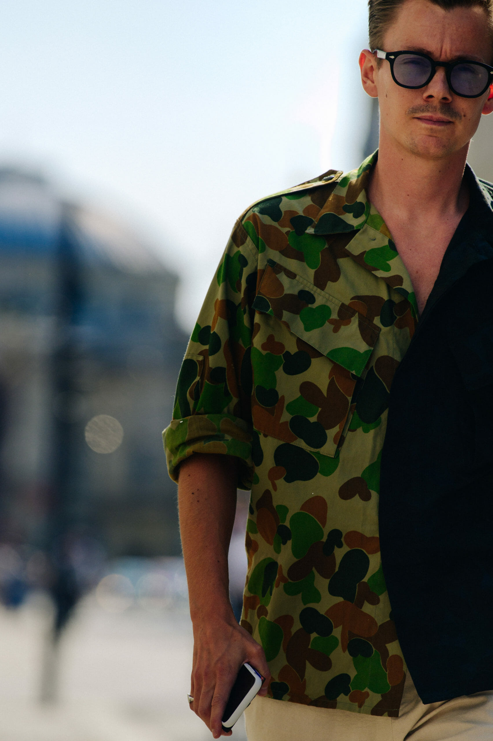 Man wearing camouflage shirt