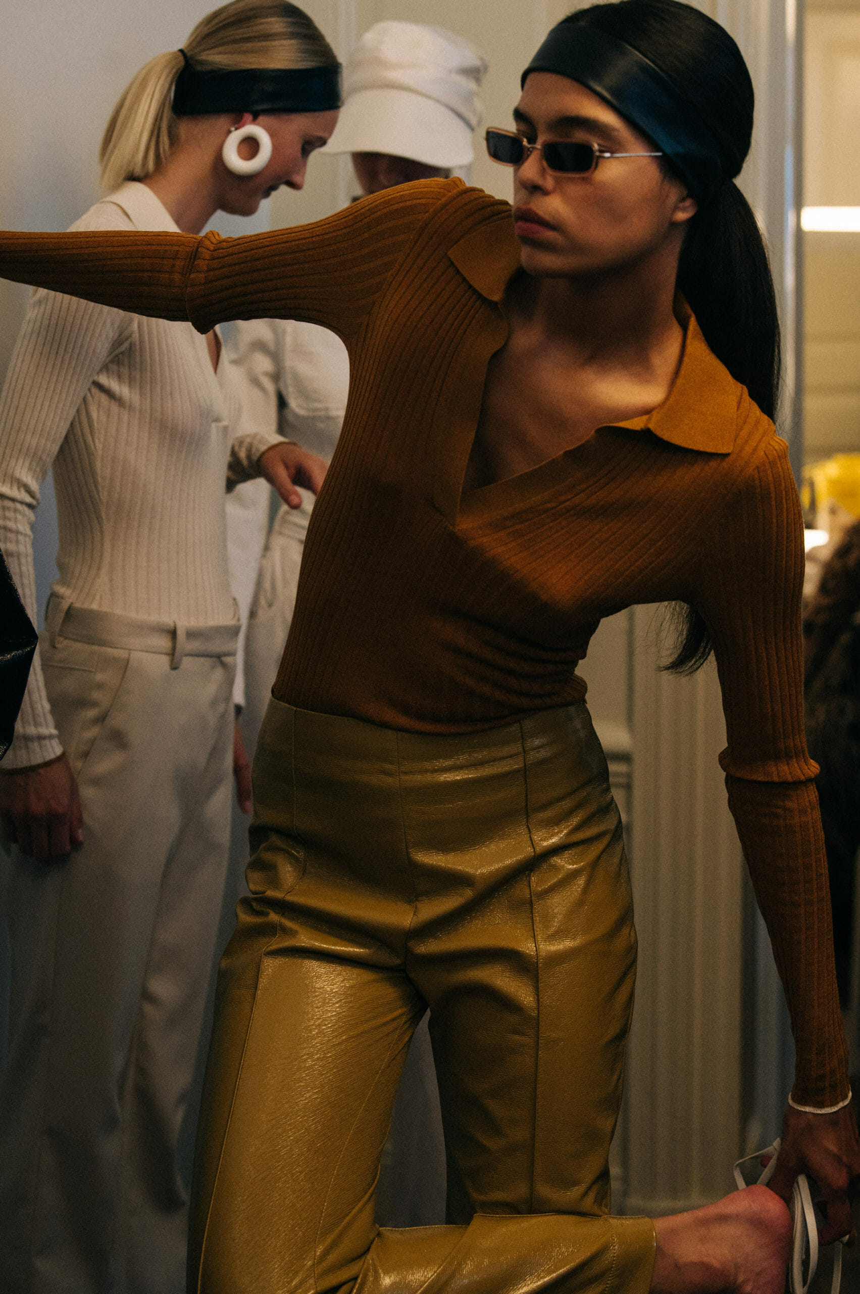 Model wearing leather headband