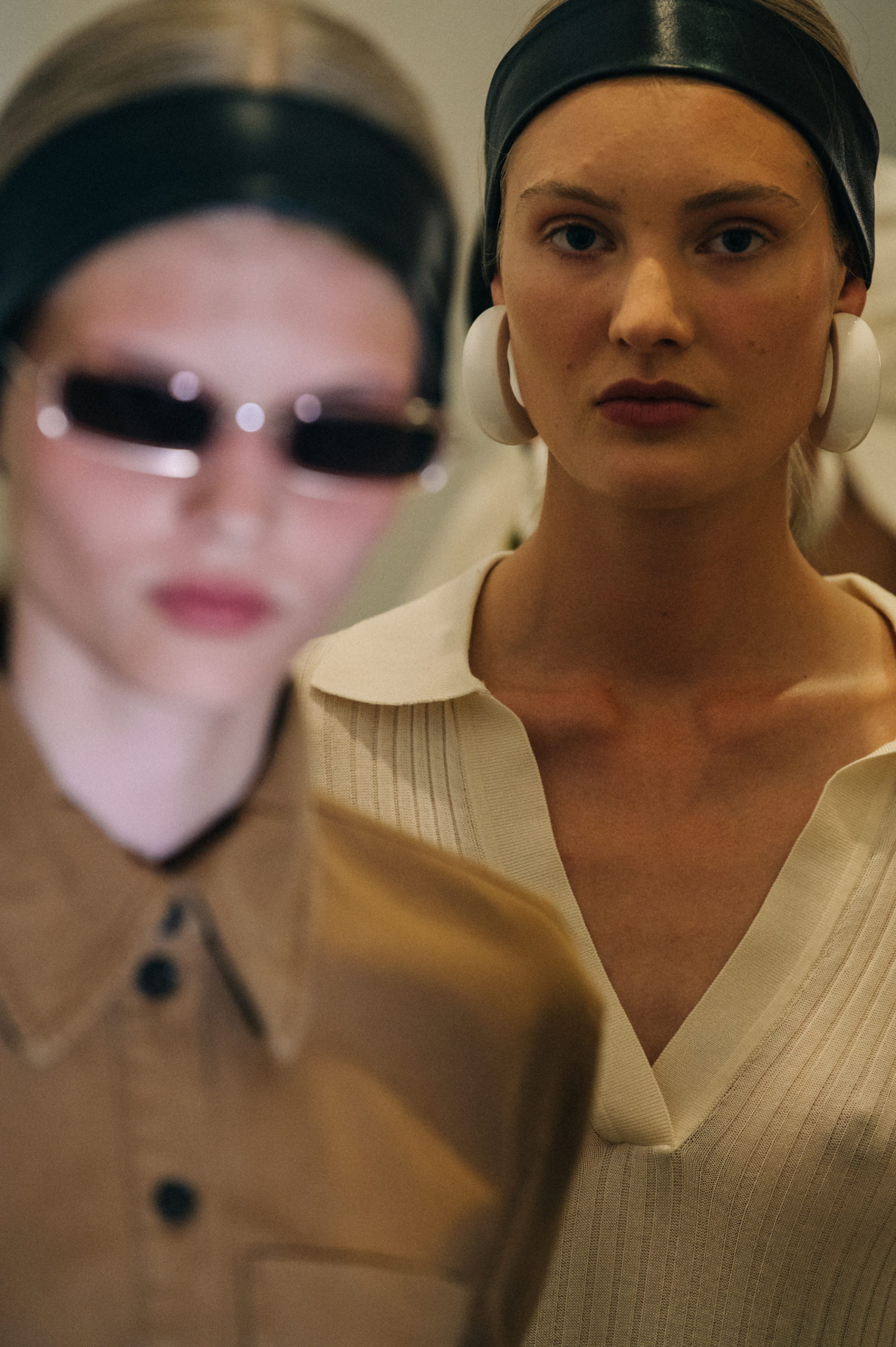 Model wearing leather headband
