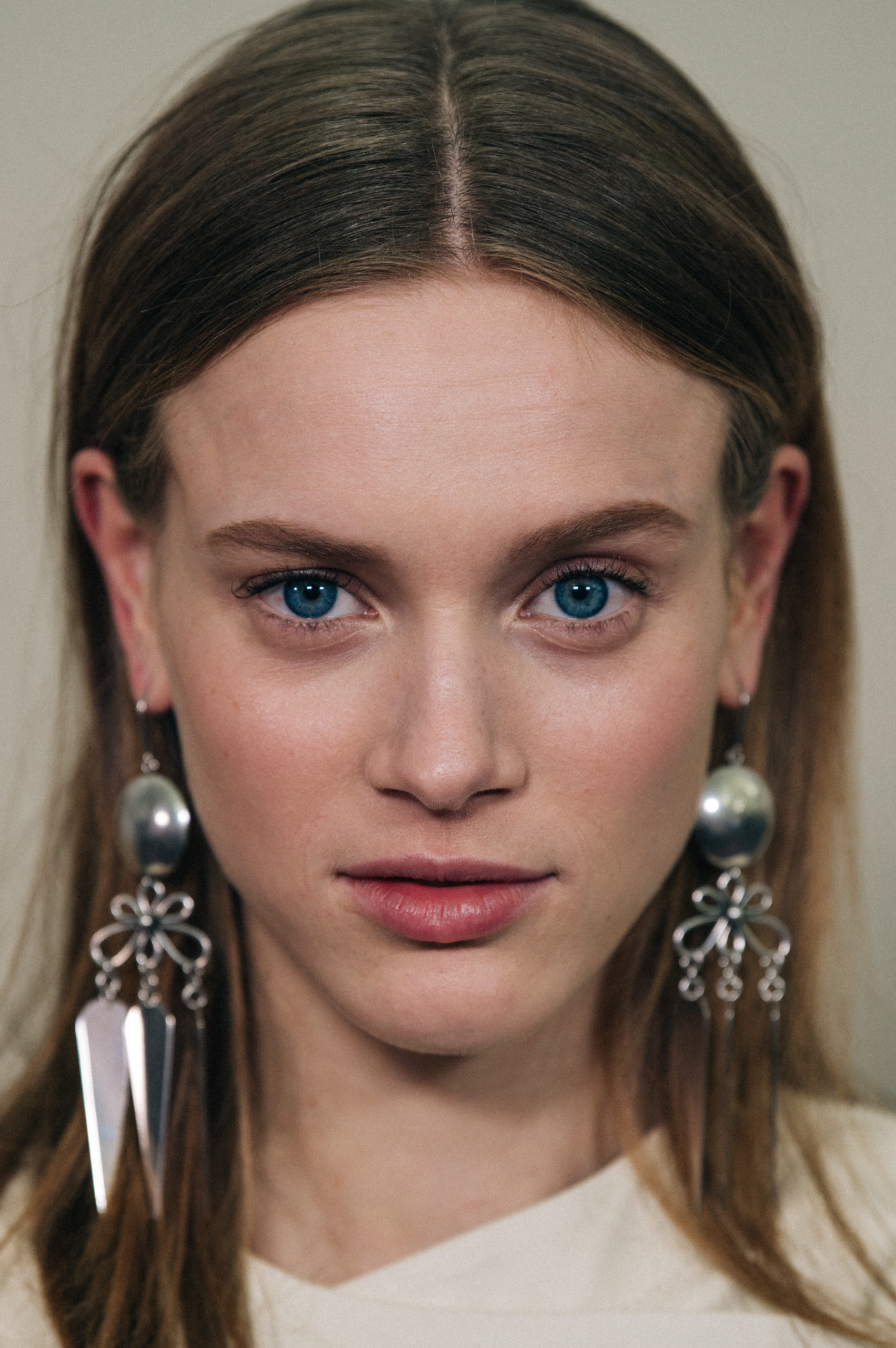 Models wearing large earrings at Isabel Marant