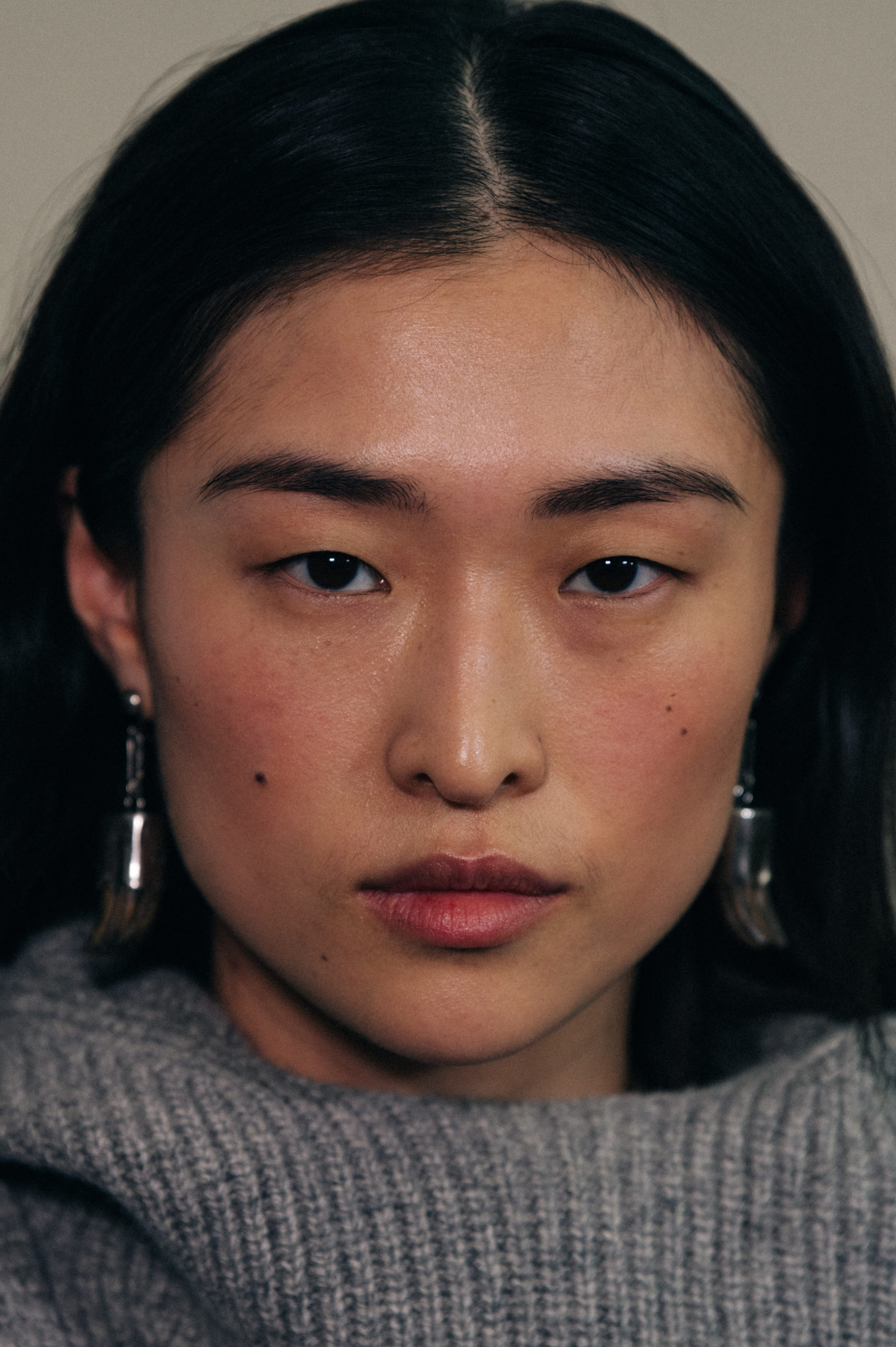 Models wearing large earrings at Isabel Marant