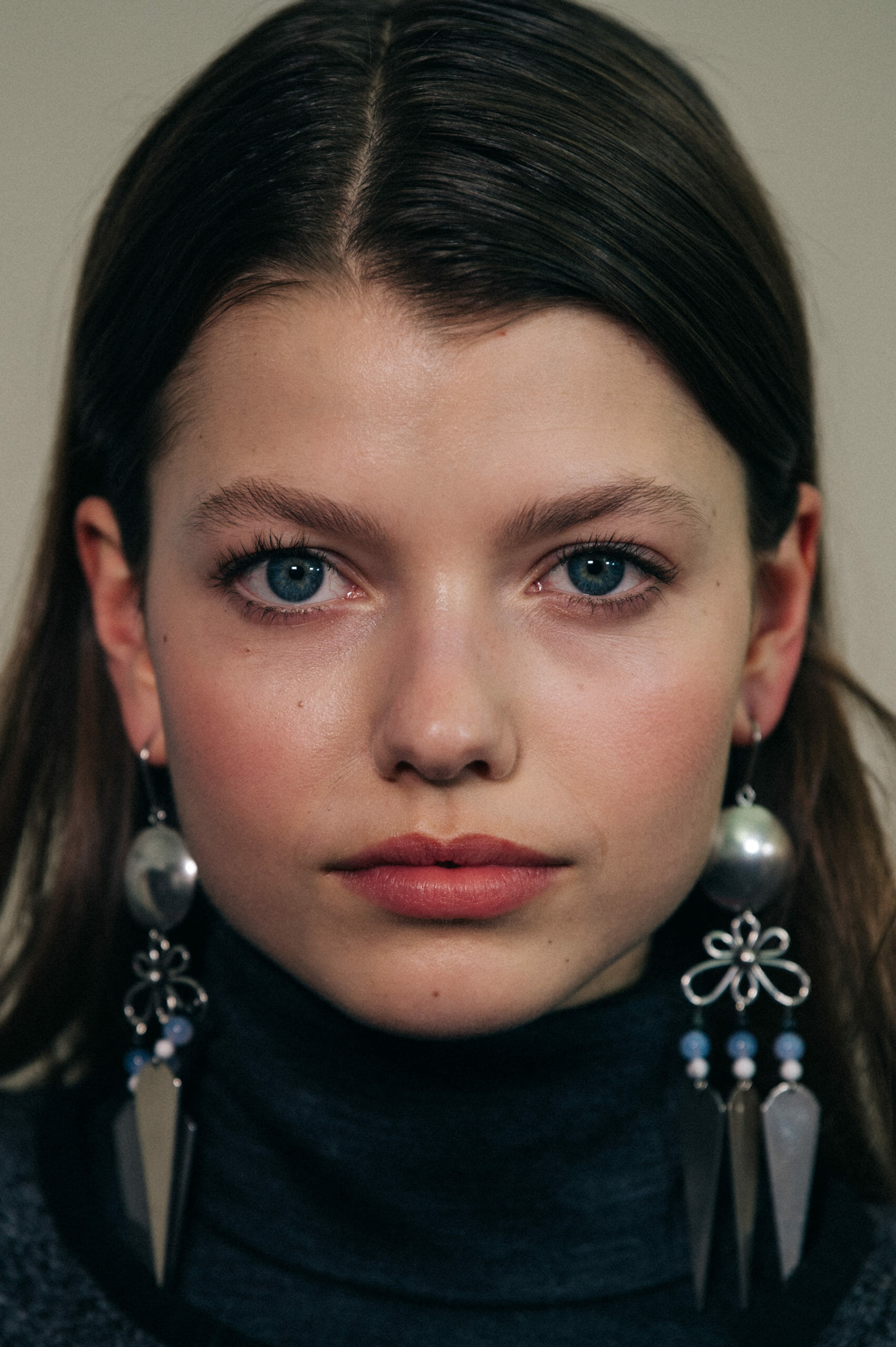 Models wearing large earrings at Isabel Marant