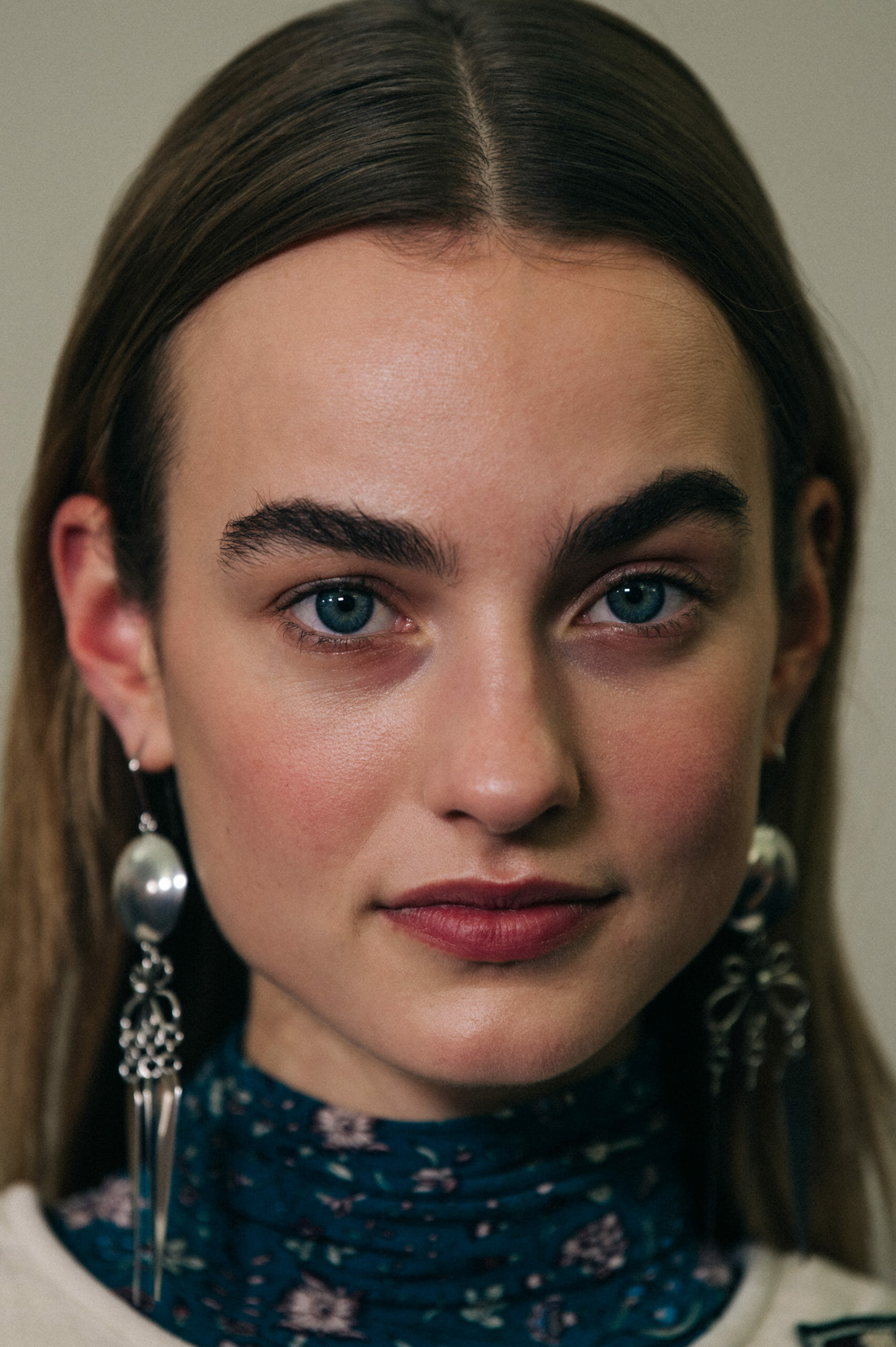 Models wearing large earrings at Isabel Marant