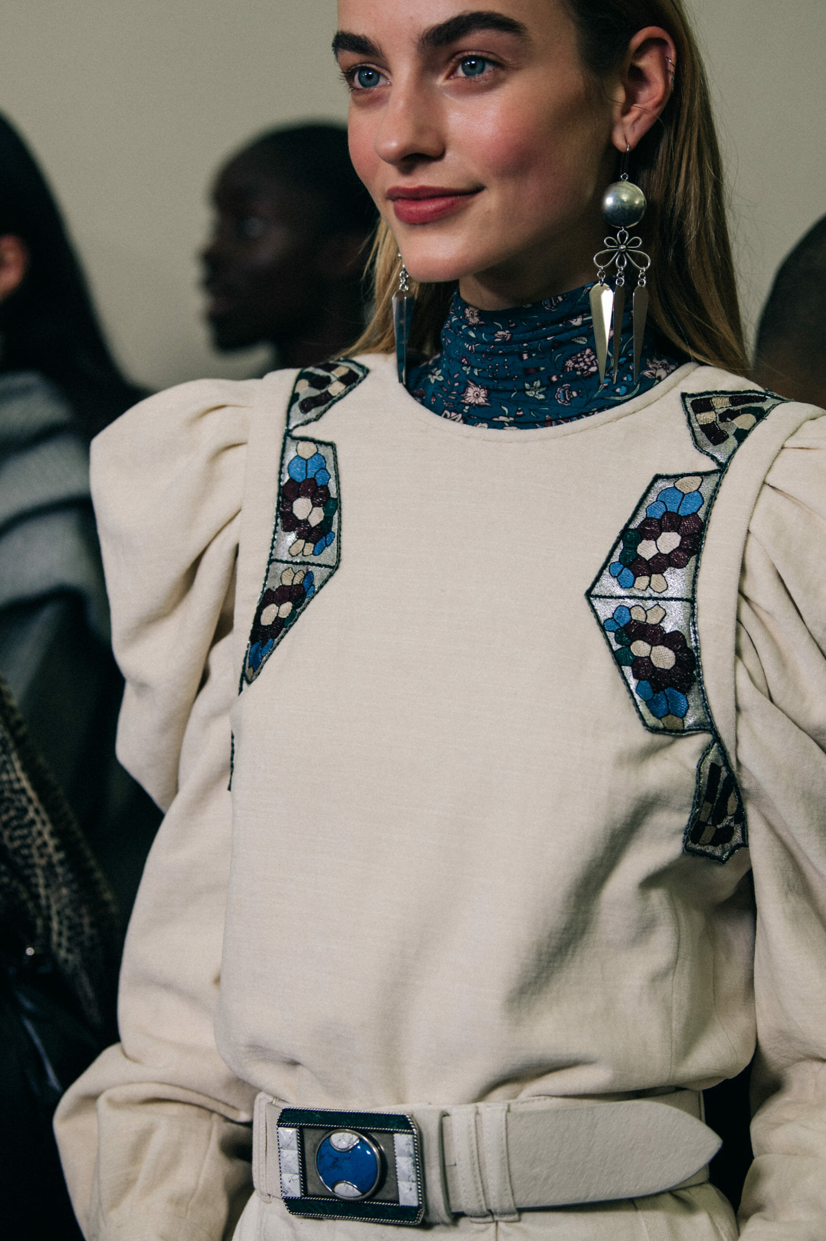 Models wearing large earrings at Isabel Marant