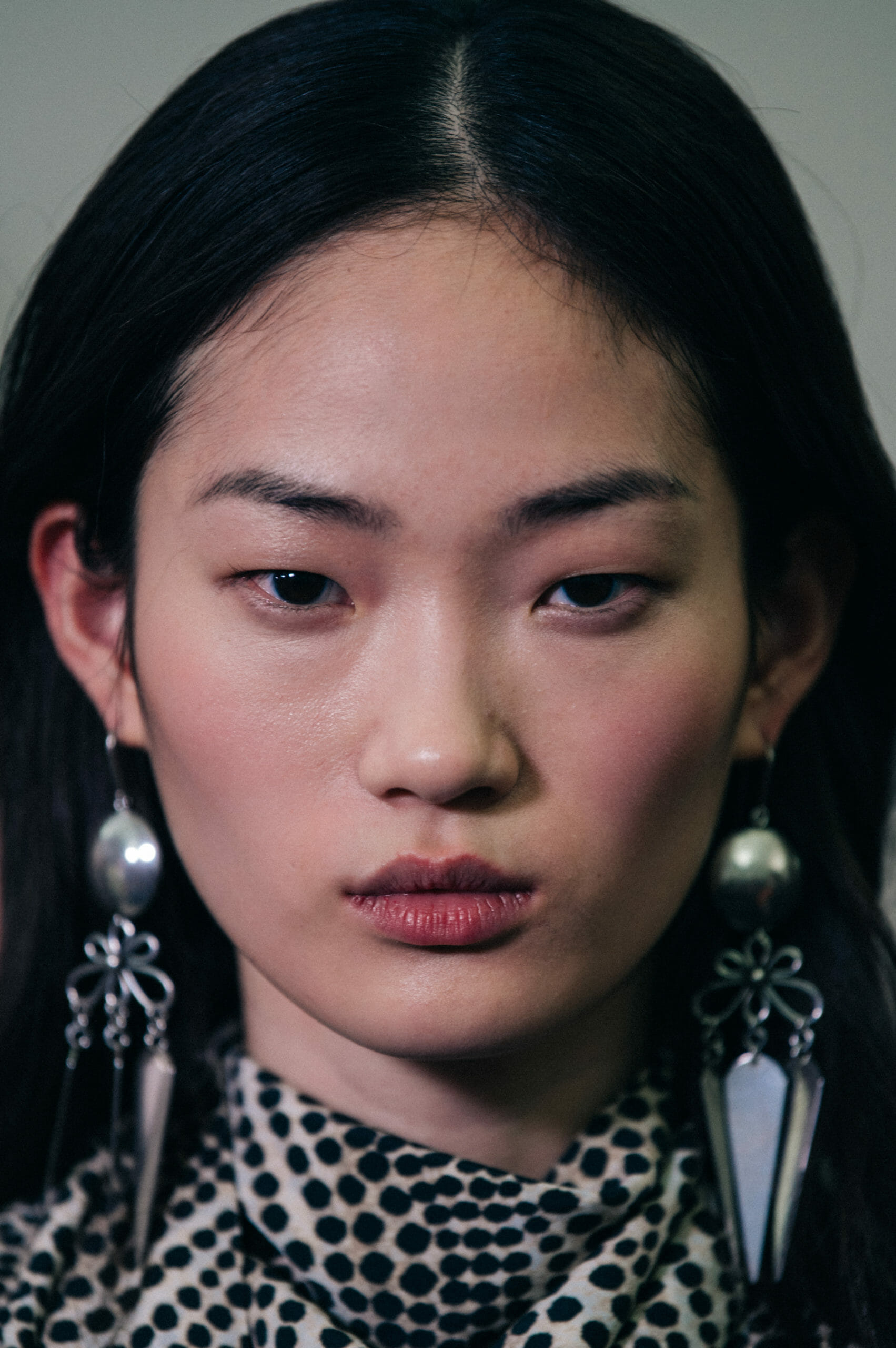 Models wearing large earrings at Isabel Marant