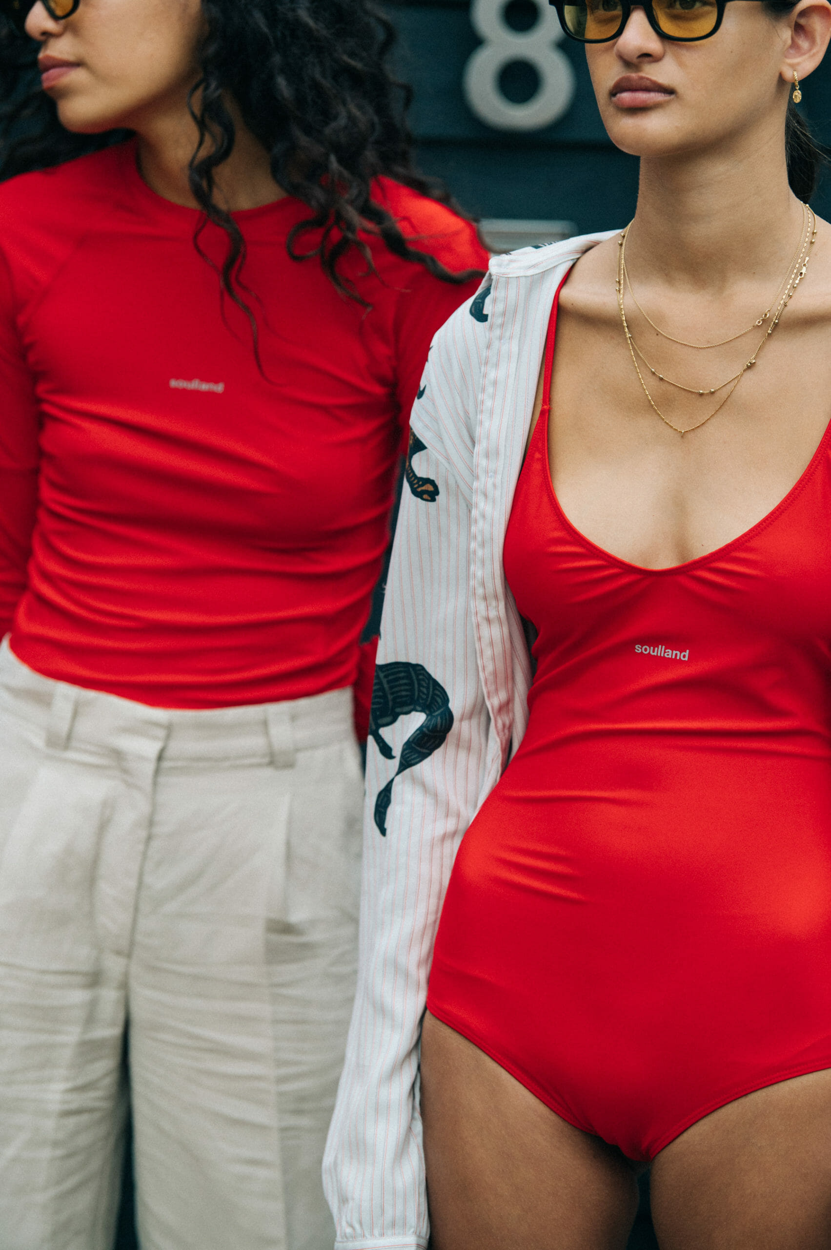 Model wearing red Soulland clothing