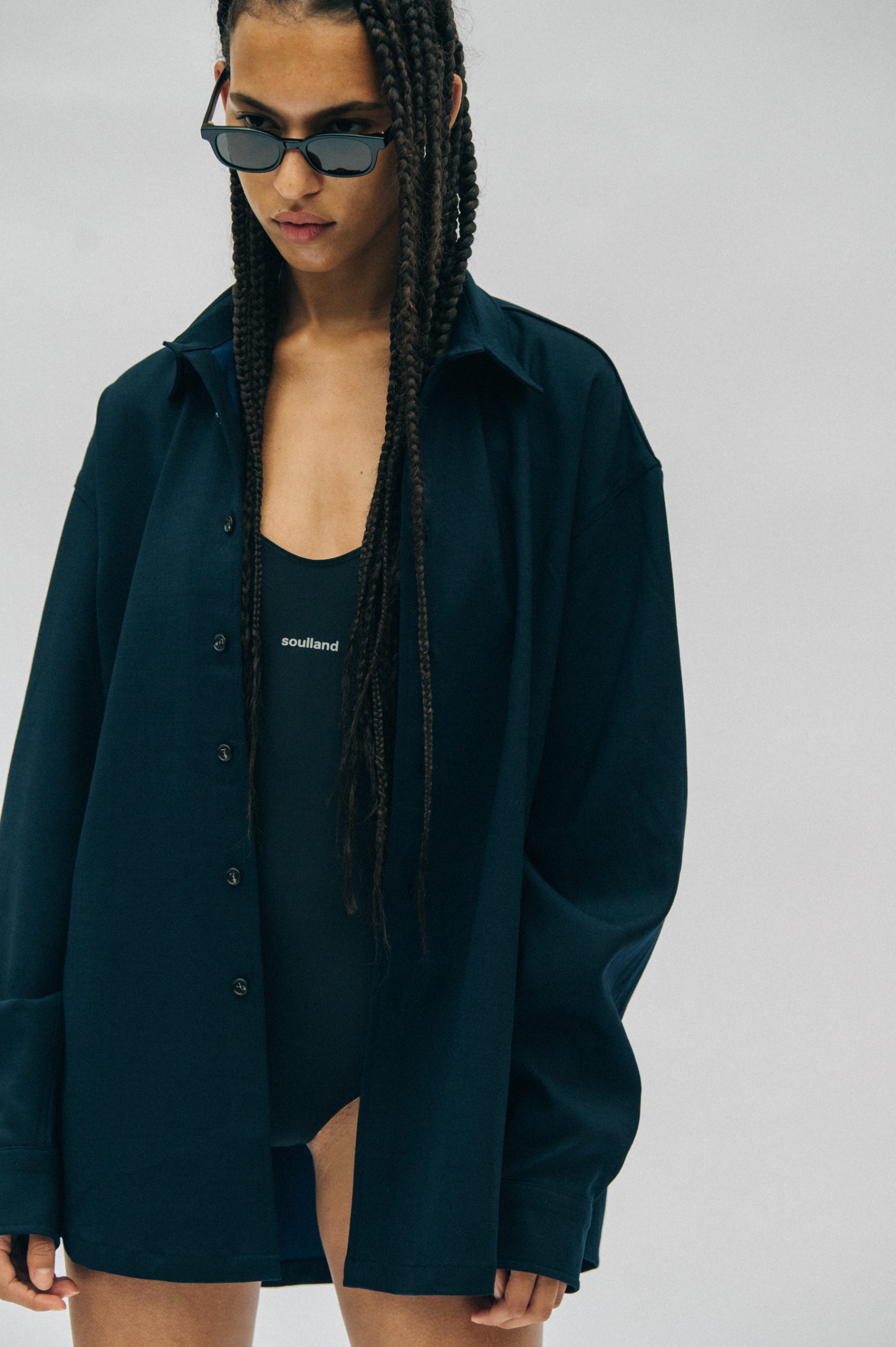Model wearing black Soulland outfit