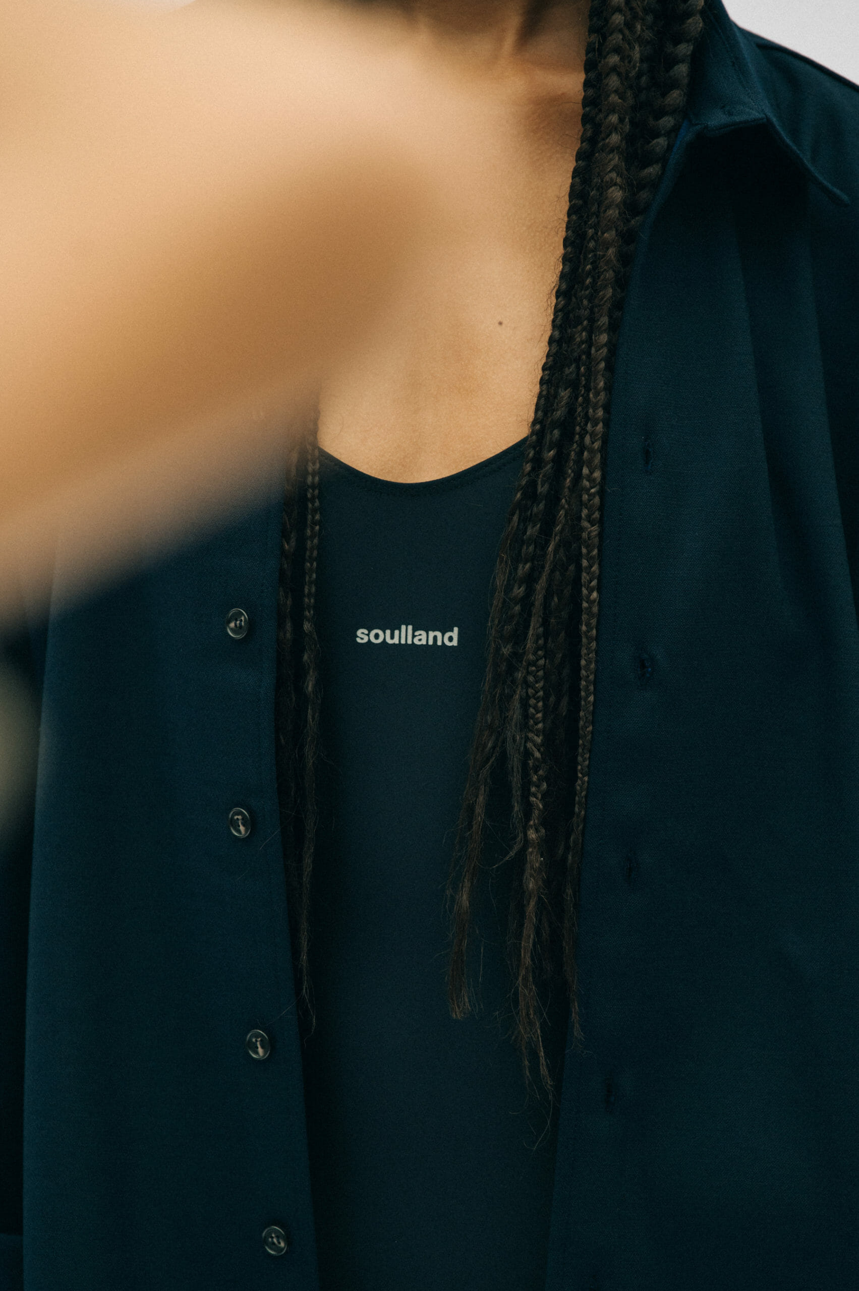 Model wearing black Soulland outfit