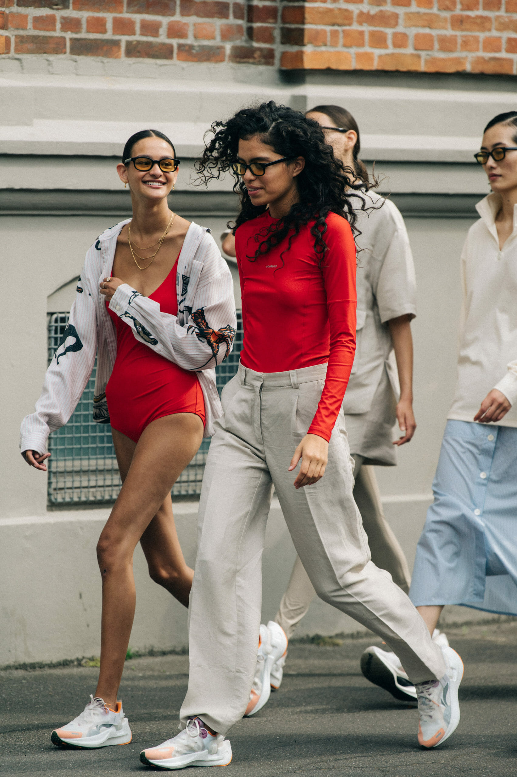 Model wearing red Soulland clothing