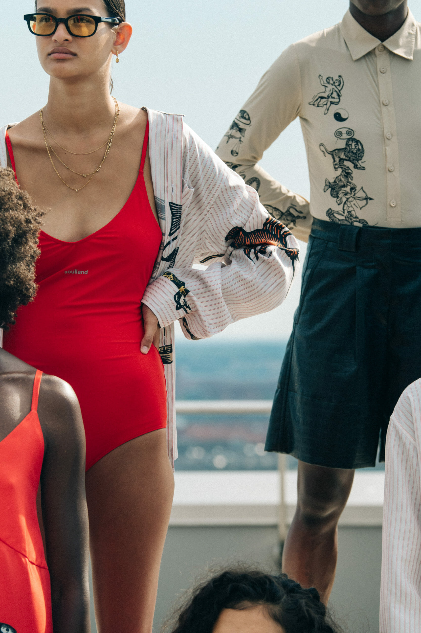 Model wearing red Soulland clothing